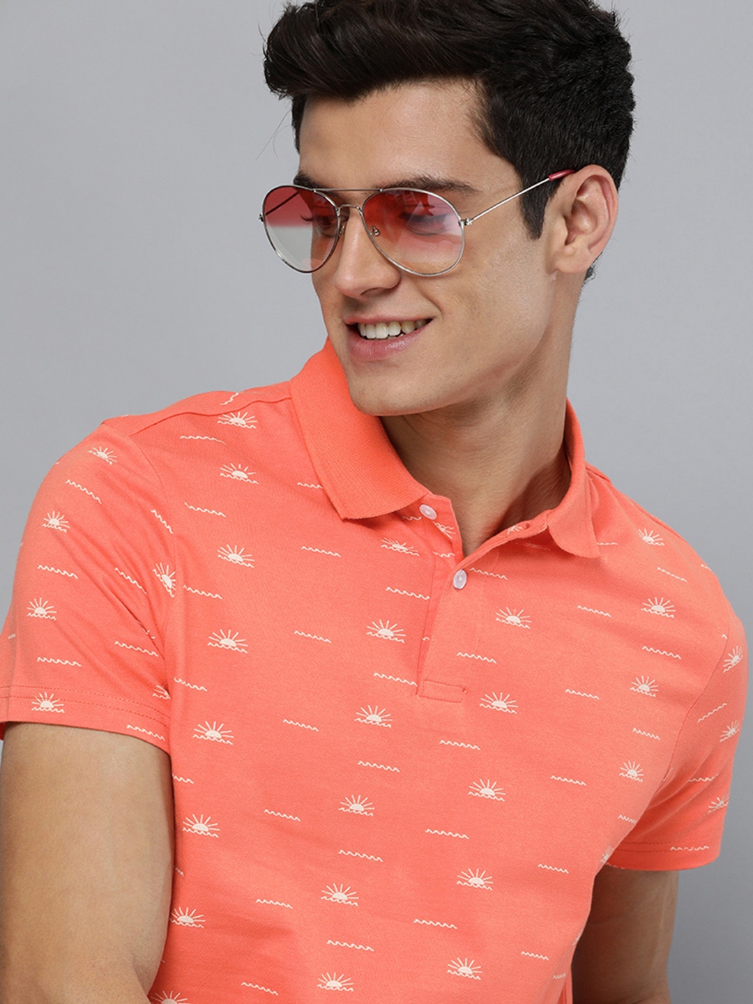 

Mast & Harbour Men Coral Orange & White Printed Polo Collar T-shirt