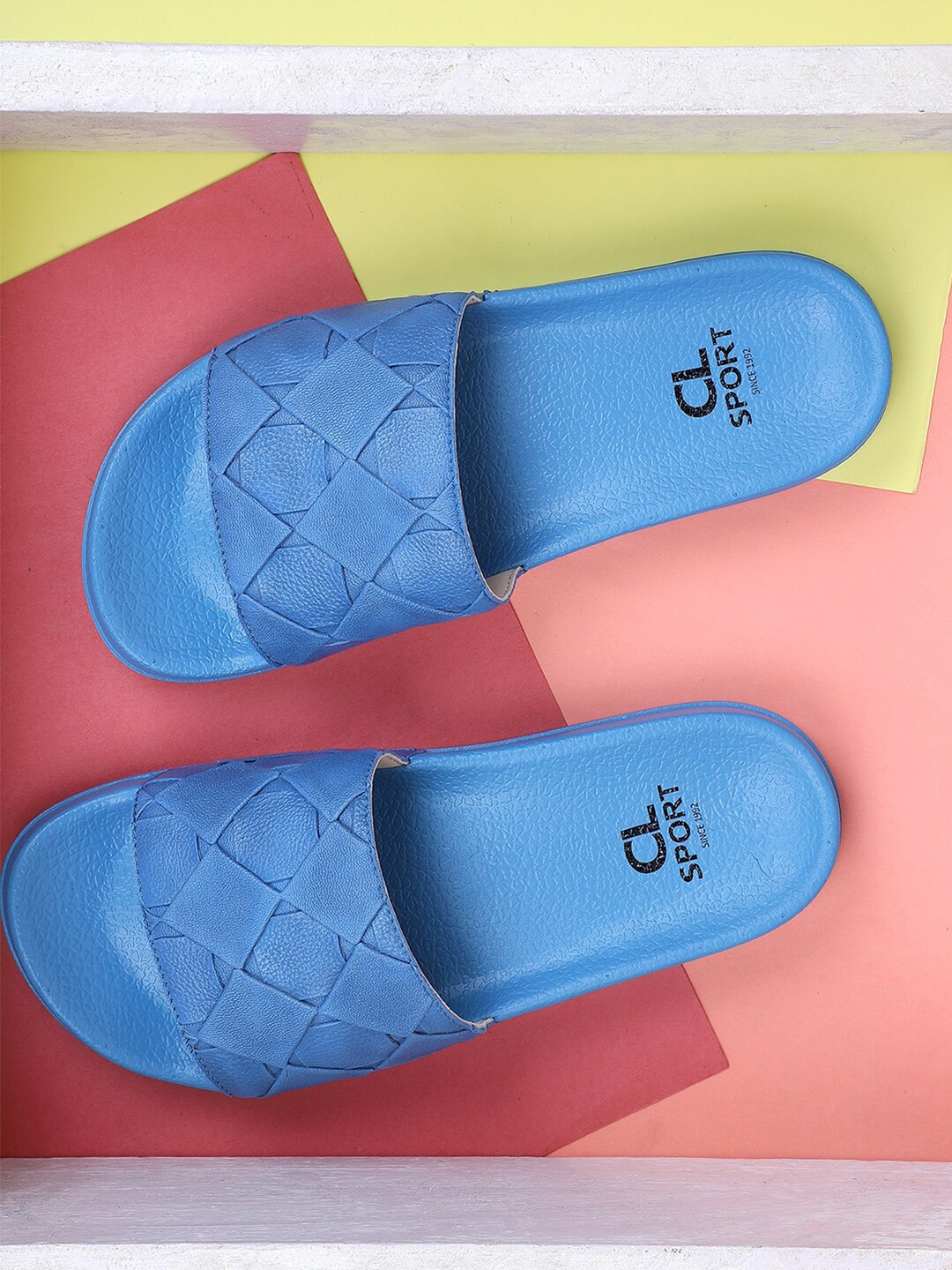 

Carlton London sports Women Blue Solid Sliders