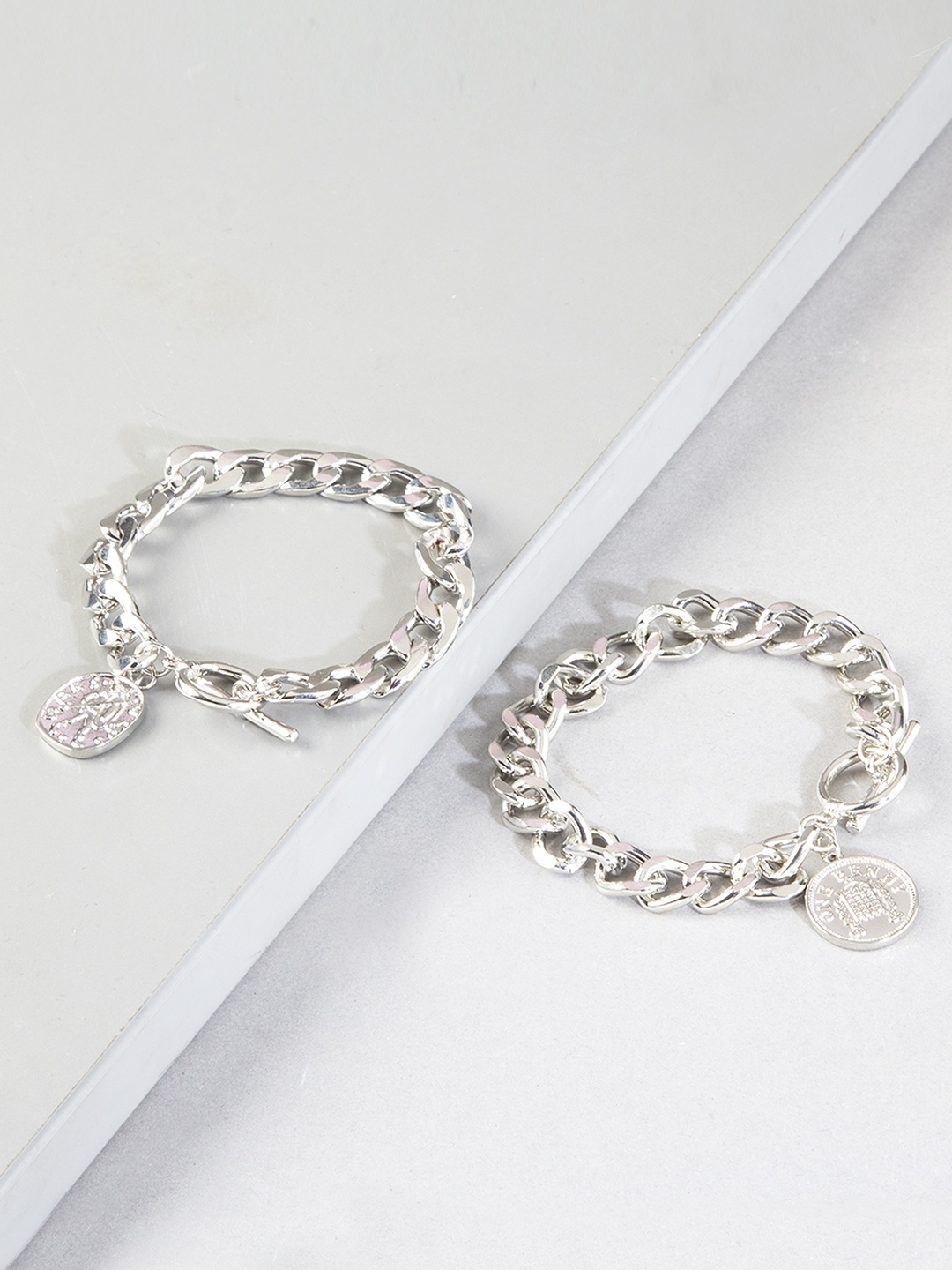 

Kazo Women 2 Silver-Toned Silver-Plated Charm Bracelet