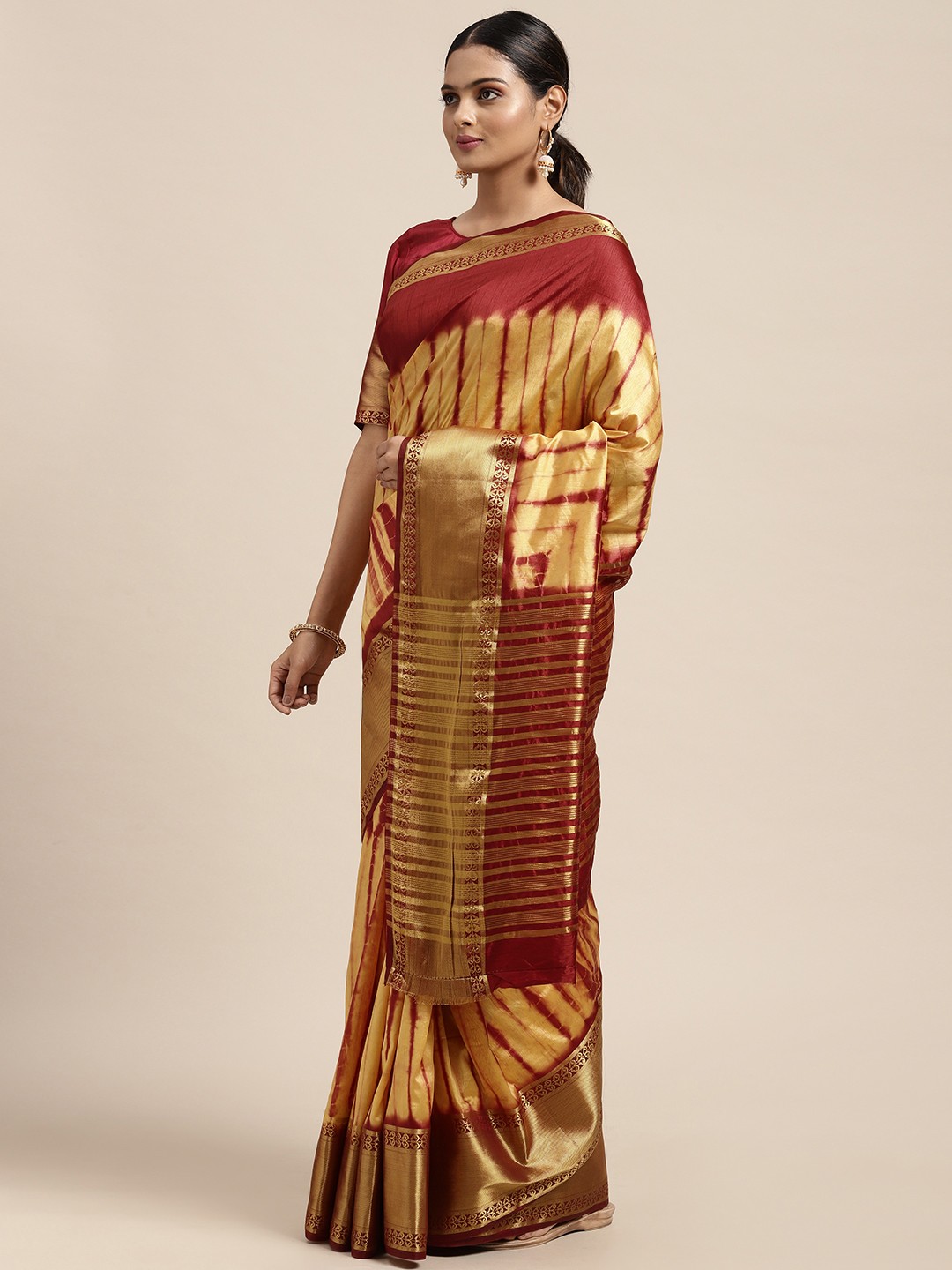 

Mitera Maroon & Gold-Toned Tie and Dye Leheriya Saree
