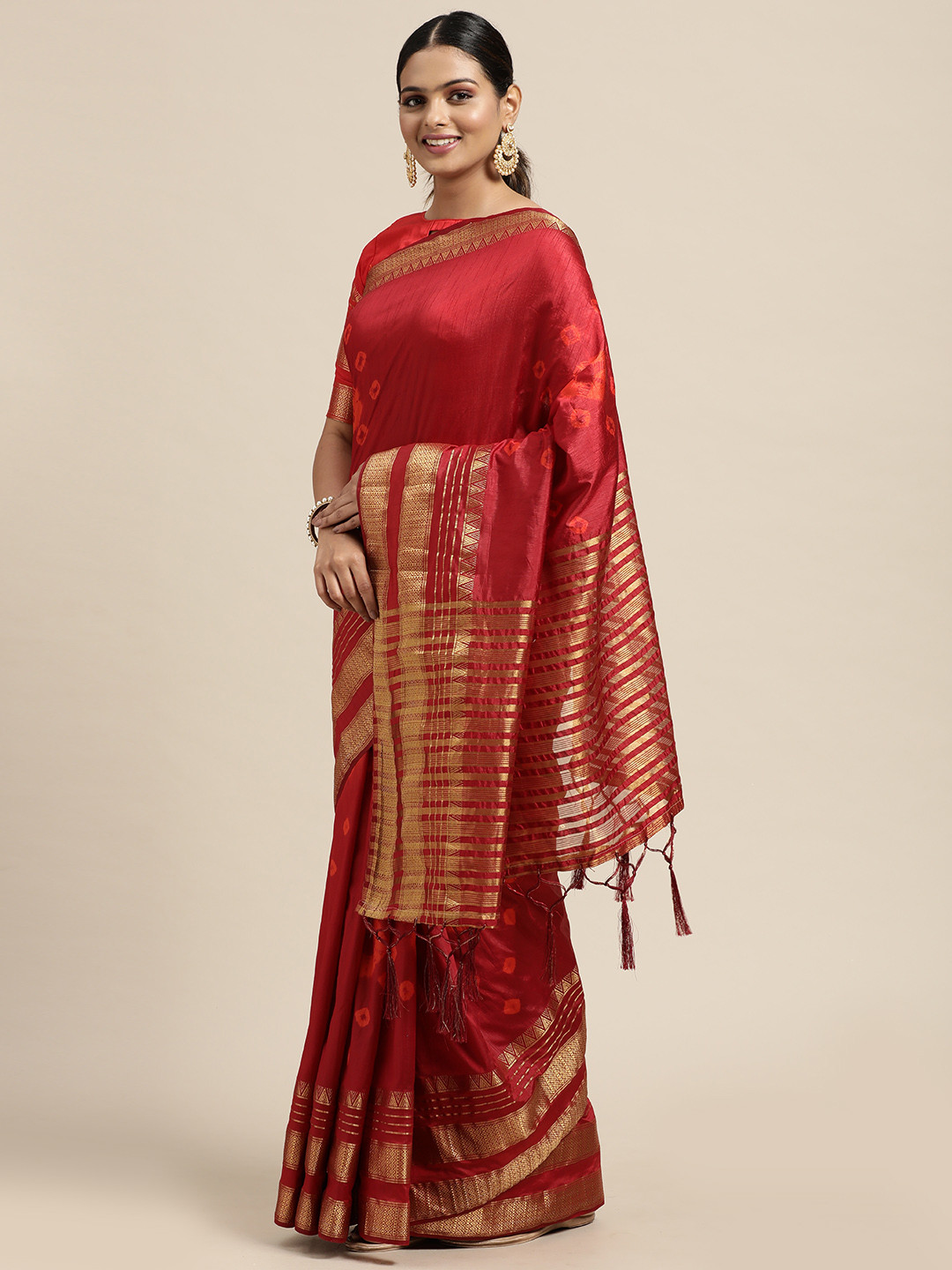 

Mitera Maroon & Gold-Toned Tie & Dye Bandhani Printed Saree