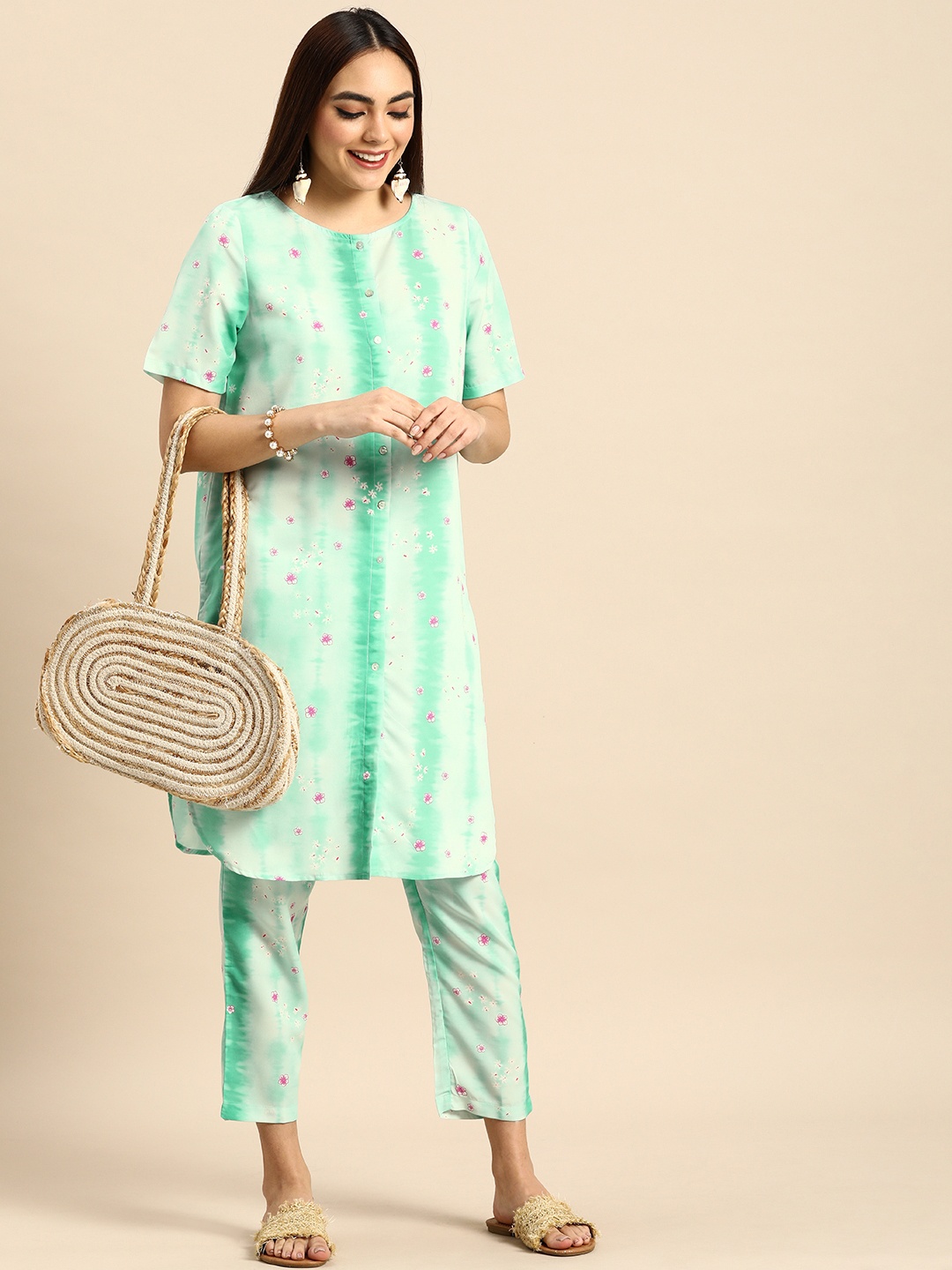 

Anouk Women Green Floral Printed Kurta with Trousers