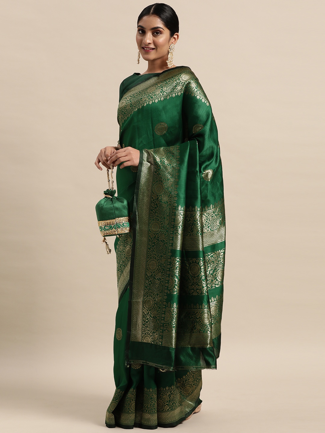 

Mitera Green Ethnic Motifs Silk Blend Saree