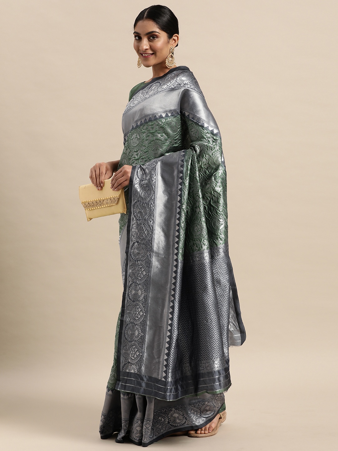 

Mitera Green & Silver-Toned Ethnic Motifs Zari Silk Blend Saree