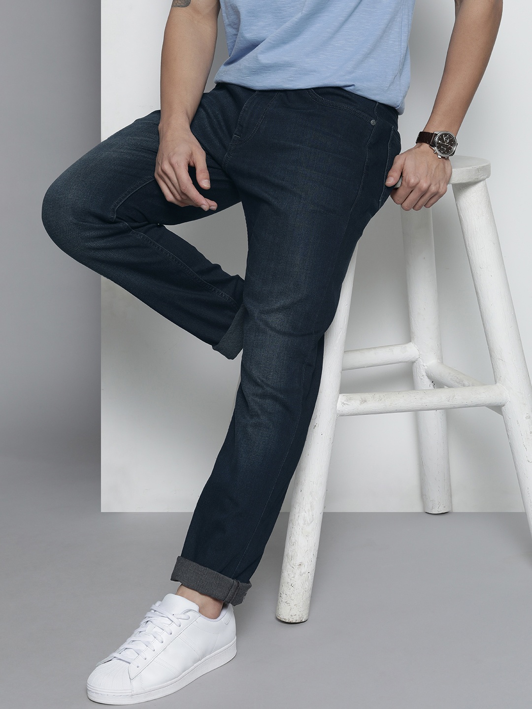 

Nautica Men Black Slim Fit Mid Rise No Fade Clean Look Stretchable Jeans