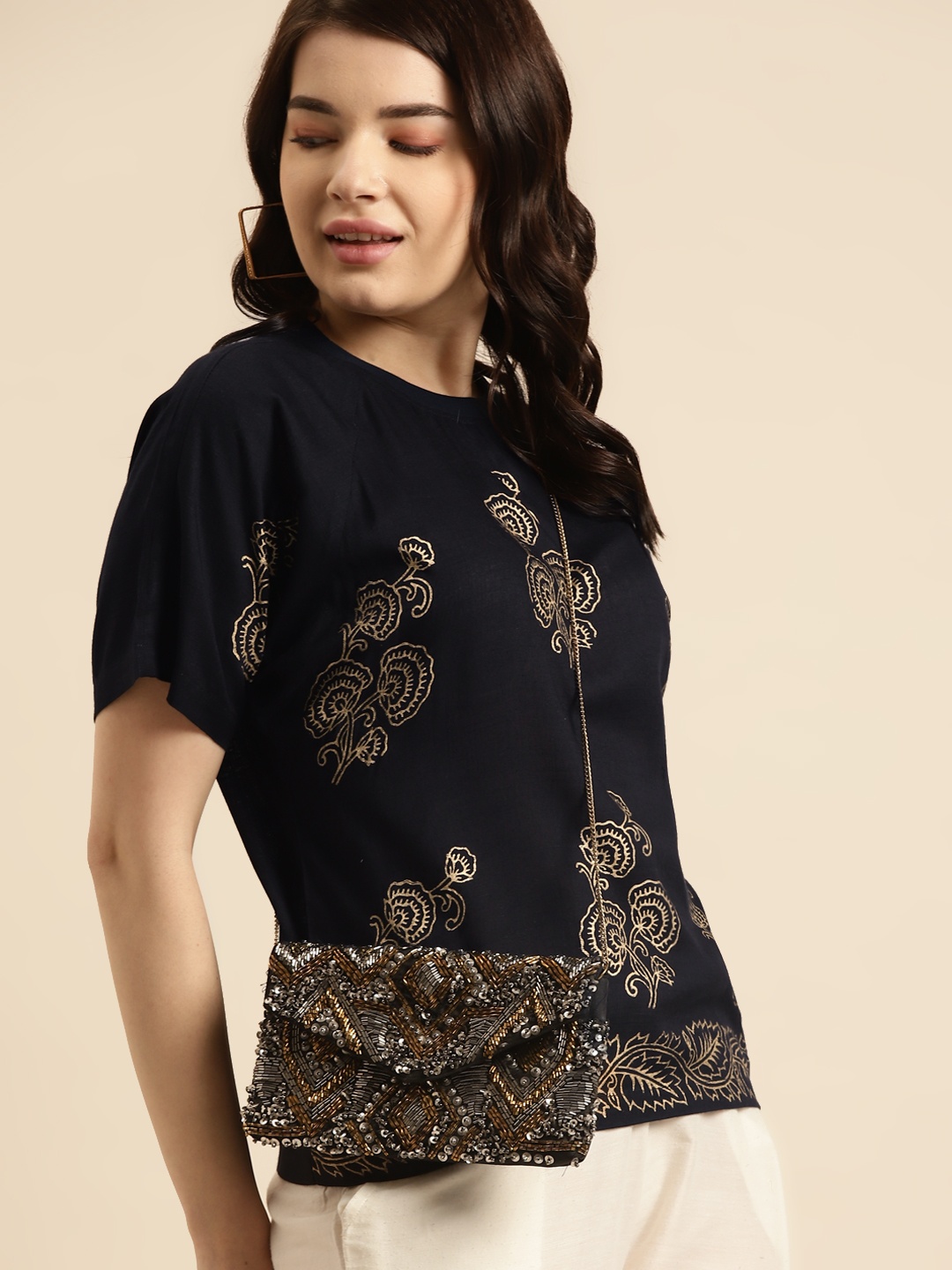

Prakrti Navy Blue & Gold-Toned Ethnic Motifs Printed Casual Regular Top