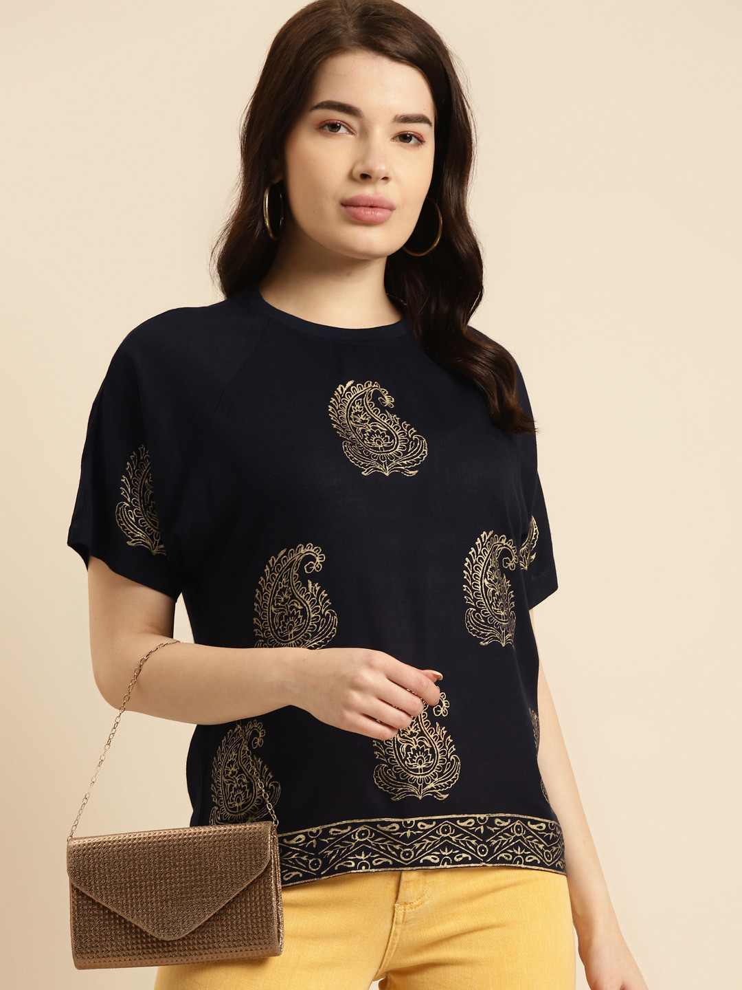 

Prakrti Navy Blue & Gold-Toned Ethnic Motifs Printed Casual Top