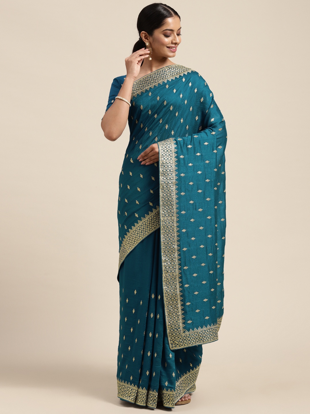

Saree mall Teal Silk Blend Vichitra Ethnic Embelished Sarees