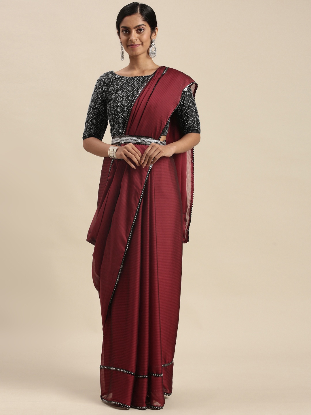 

Mitera Maroon Sequinned Border Saree