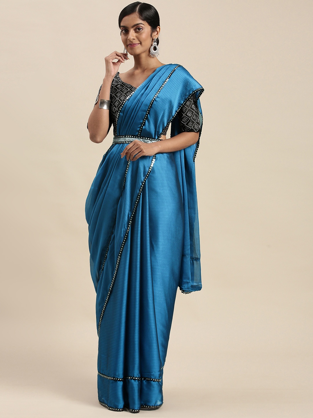 

Mitera Blue Sequinned Border Saree