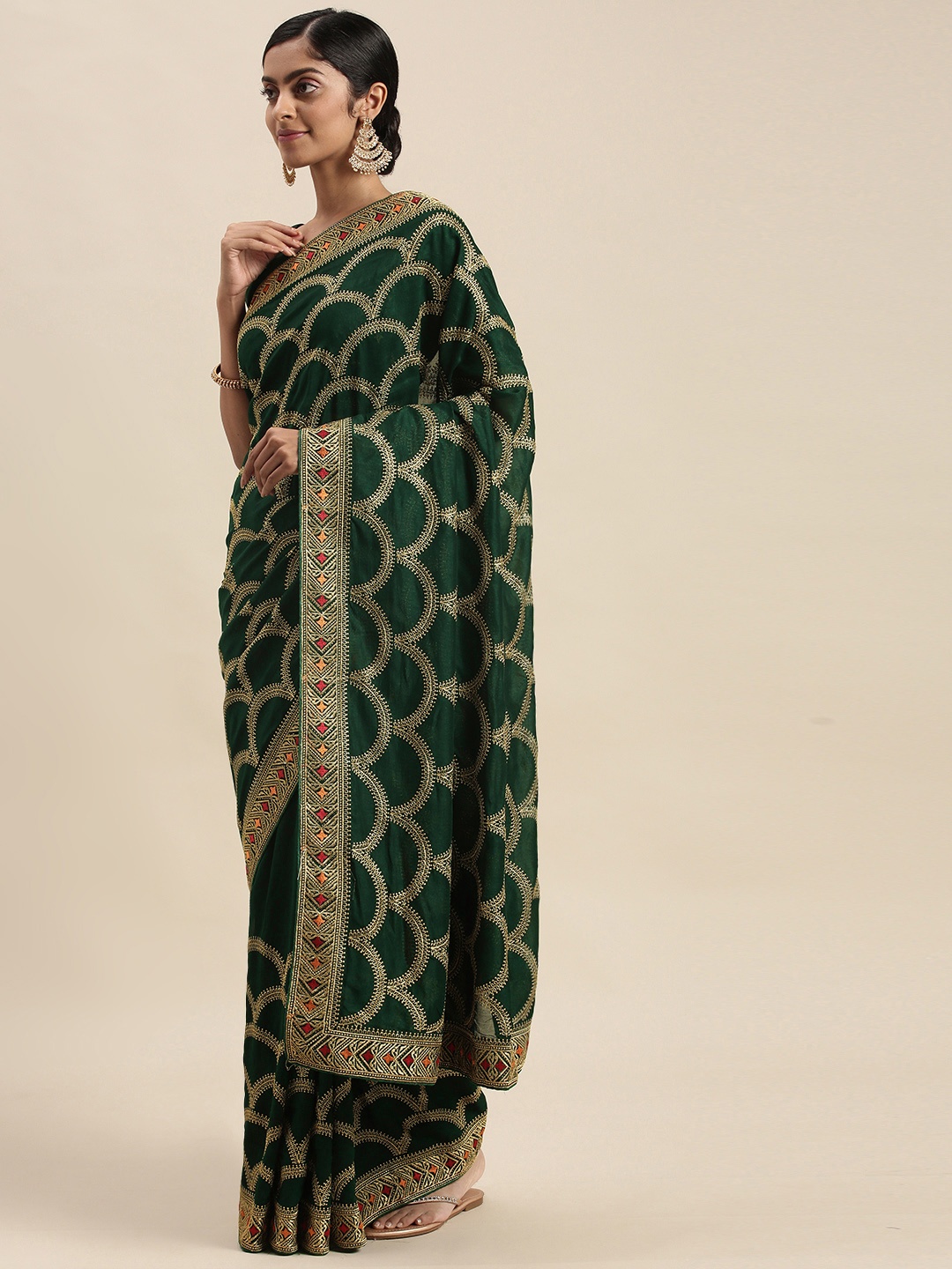 

Mitera Green Embroidered Silk Blend Saree