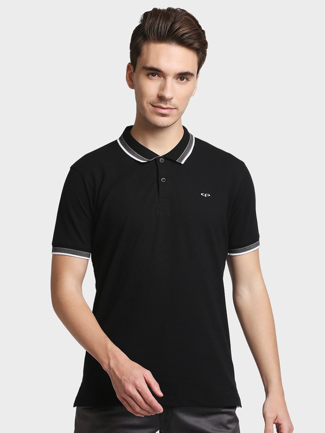 

ColorPlus Men Black Solid Polo Collar T-shirt