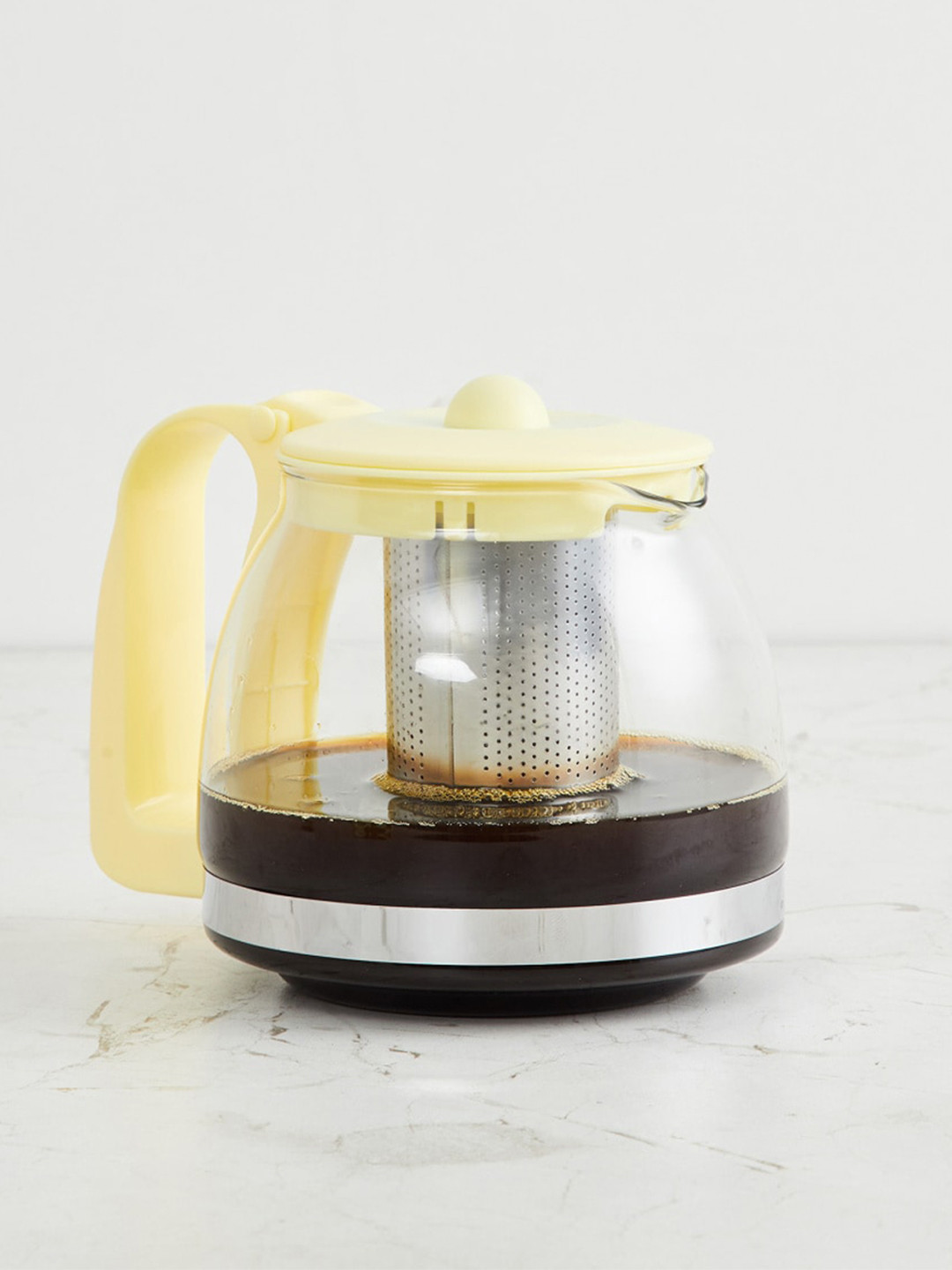 

Home Centre Transparent & Yellow Solid Ceramic Transparent Tea Pot