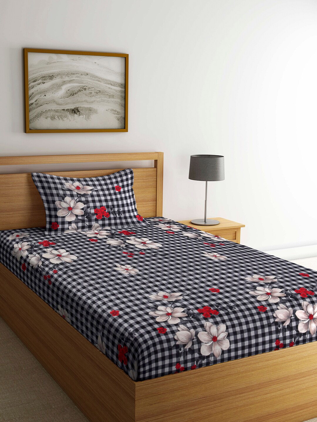 

Arrabi Black & White Floral 130 TC Single Bedsheet with 1 Pillow Cover