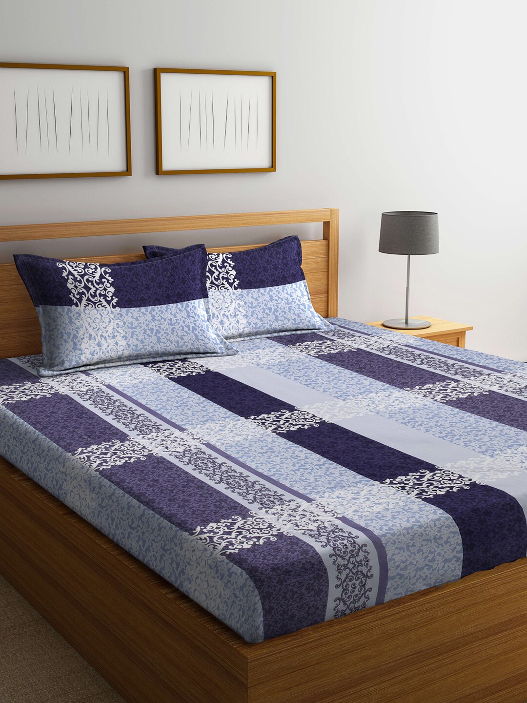 

Arrabi Blue & White Ethnic Motifs 300 TC King Bedsheet with 2 Pillow Covers