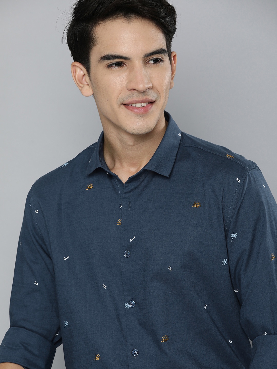 

Mast & Harbour Men Navy Blue & yellow Printed Pure Cotton Casual Shirt