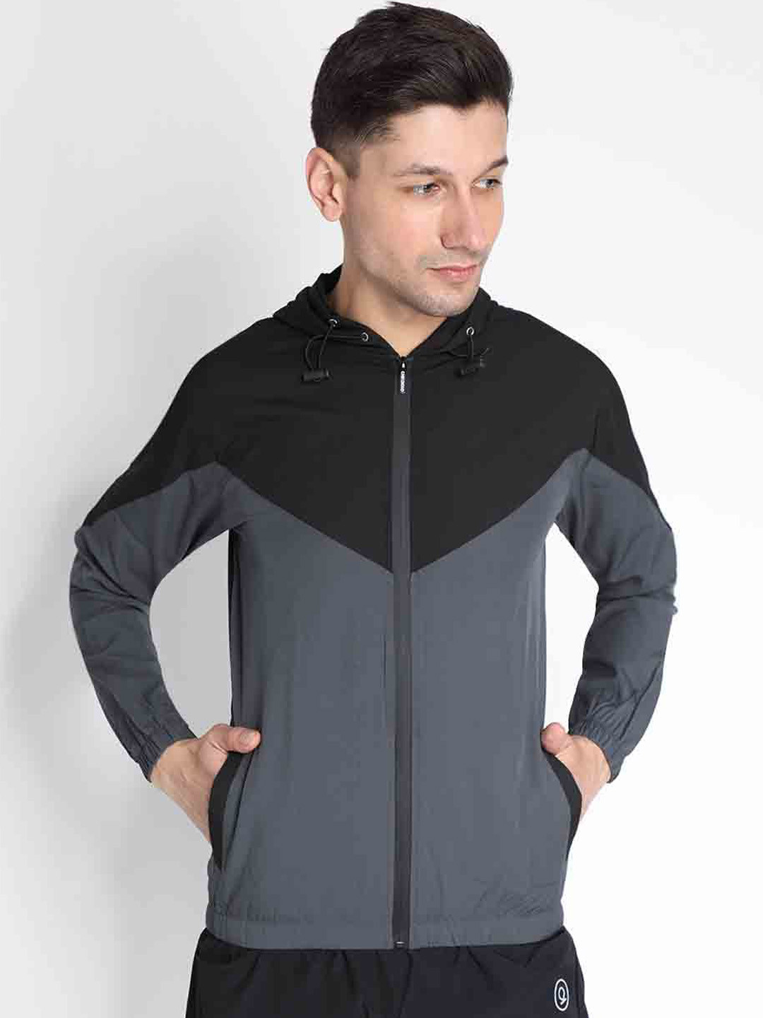 

CHKOKKO Men Black Grey Colourblocked Windcheater and Water Resistant Outdoor Sporty Jacket