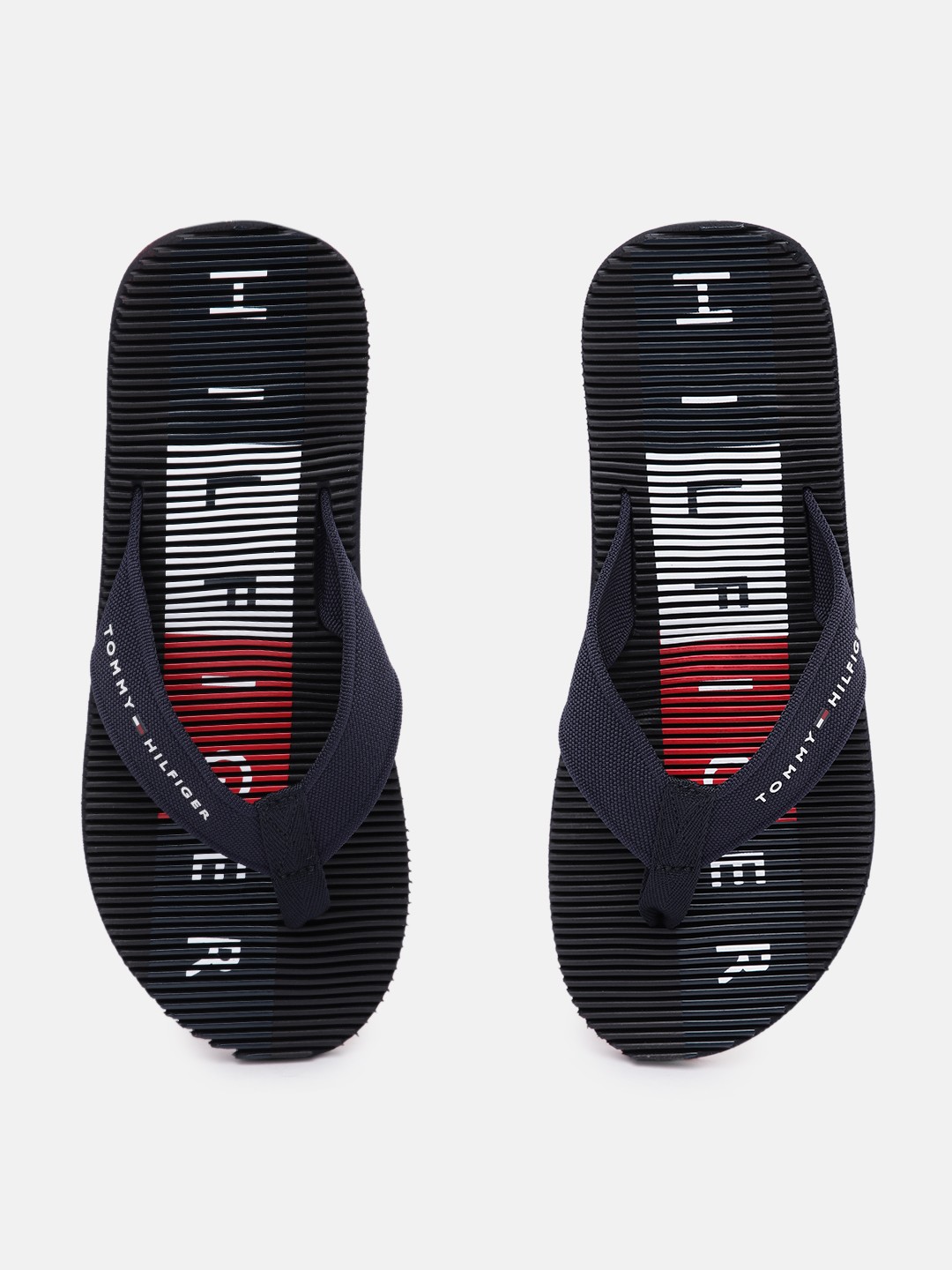

Tommy Hilfiger Men Navy Blue & Black Printed Massage Footbed Flip-Flops
