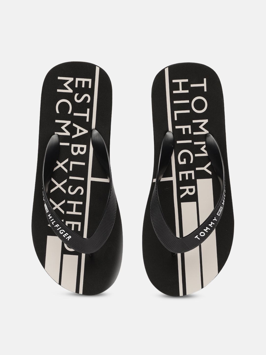 

Tommy Hilfiger Men Black & White Printed Thong Flip-Flops