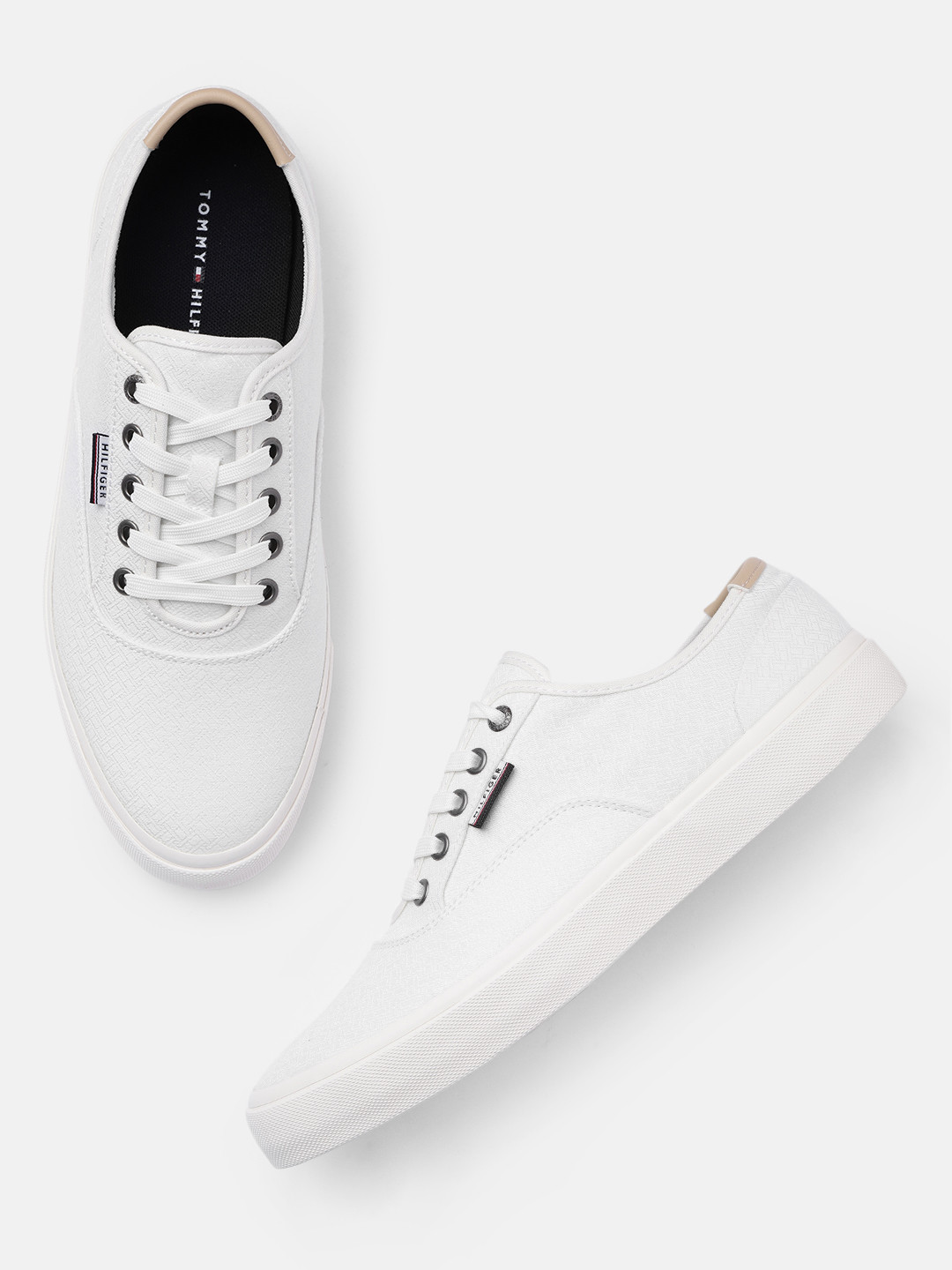 

Tommy Hilfiger Men White Solid Sneakers