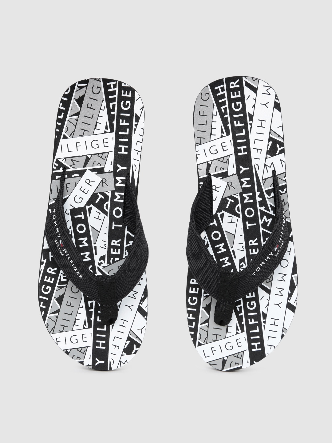 

Tommy Hilfiger Men Black & White Printed Thong Flip-Flops