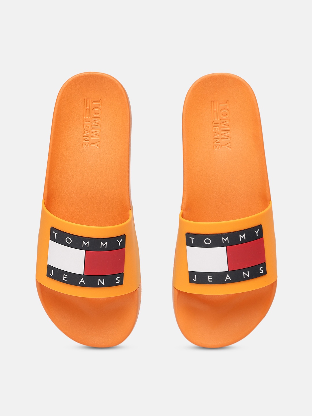 

Tommy Hilfiger Men Orange Printed Rubber Sliders