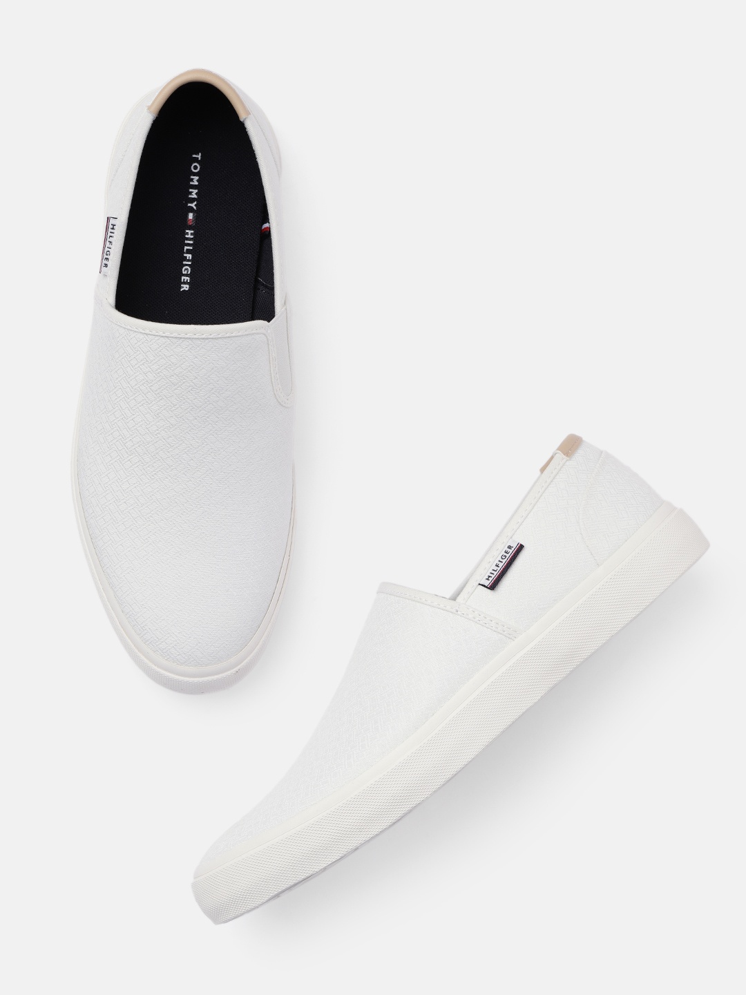 

Tommy Hilfiger Men White Solid Slip-On Sneakers