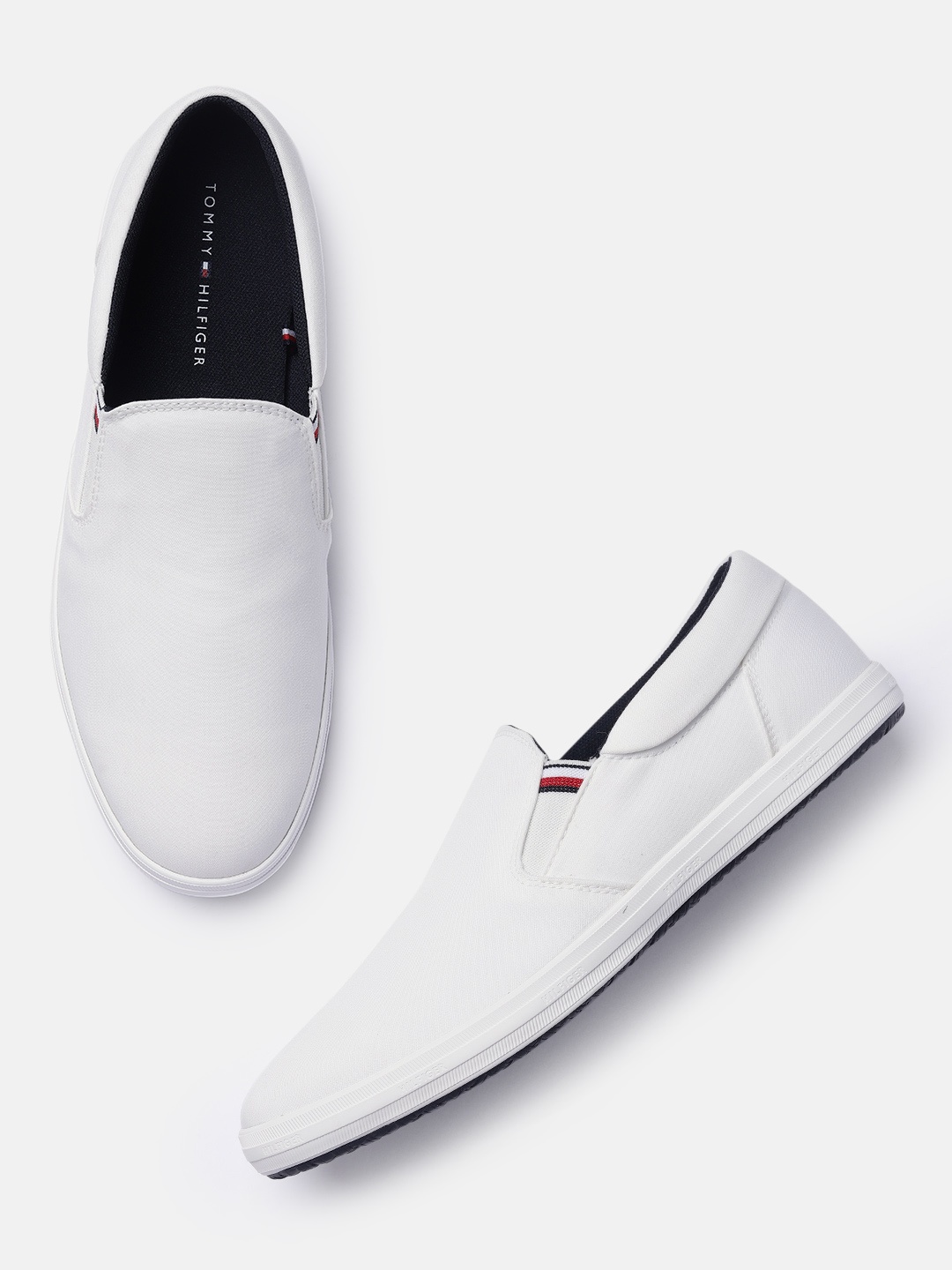 

Tommy Hilfiger Men White Solid Slip-On Sneakers