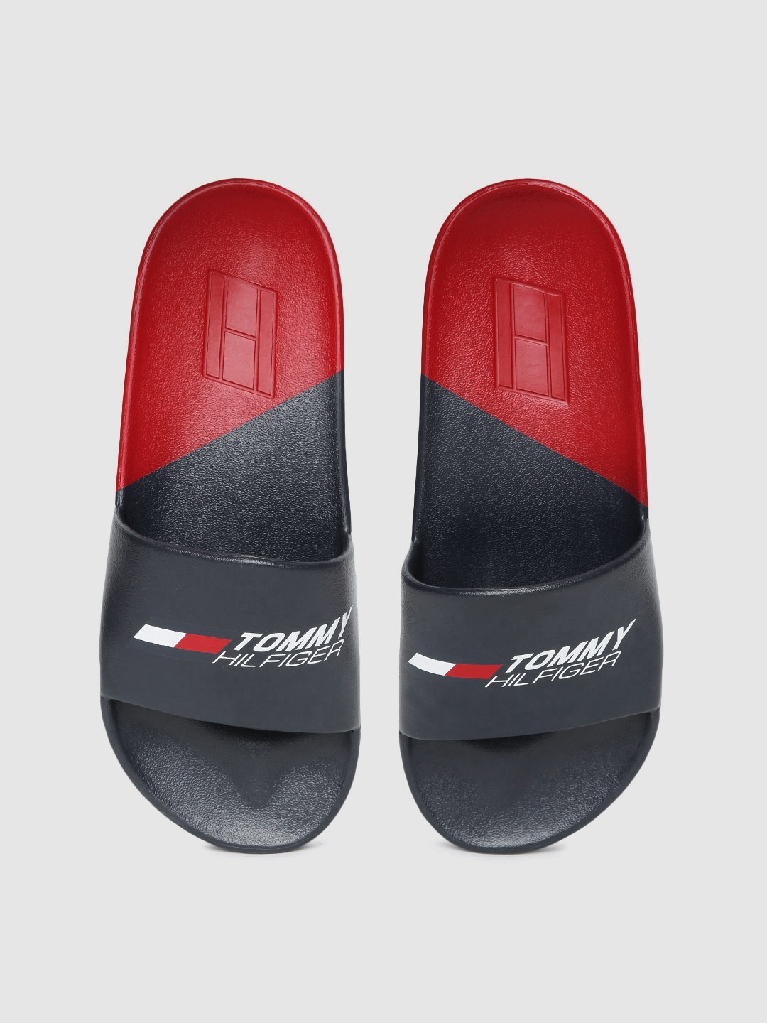 

Tommy Hilfiger Men Blue Printed Croslite Sliders