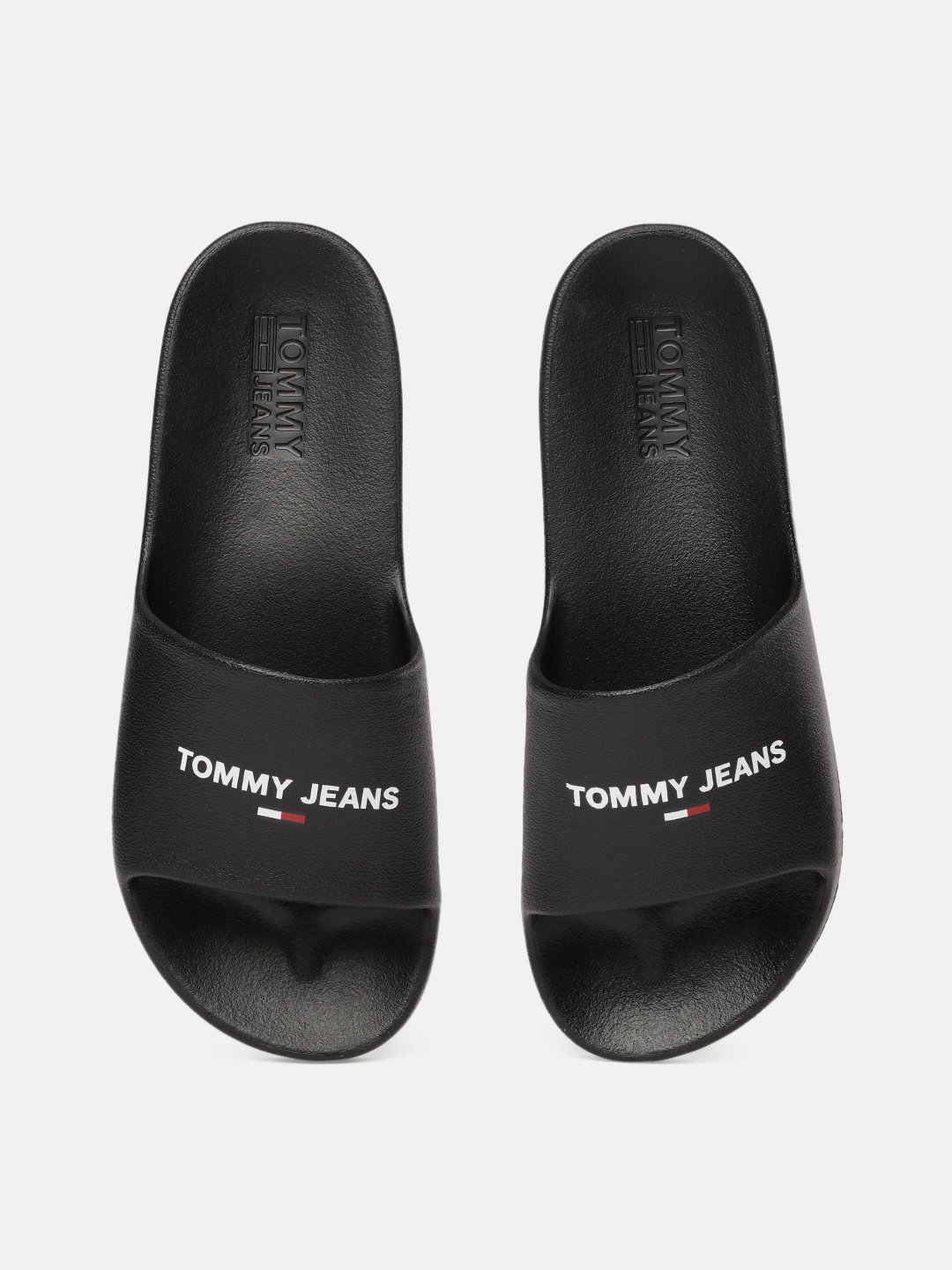 

Tommy Hilfiger Men Black Brand Logo Print Essential Pool Croslite Sliders