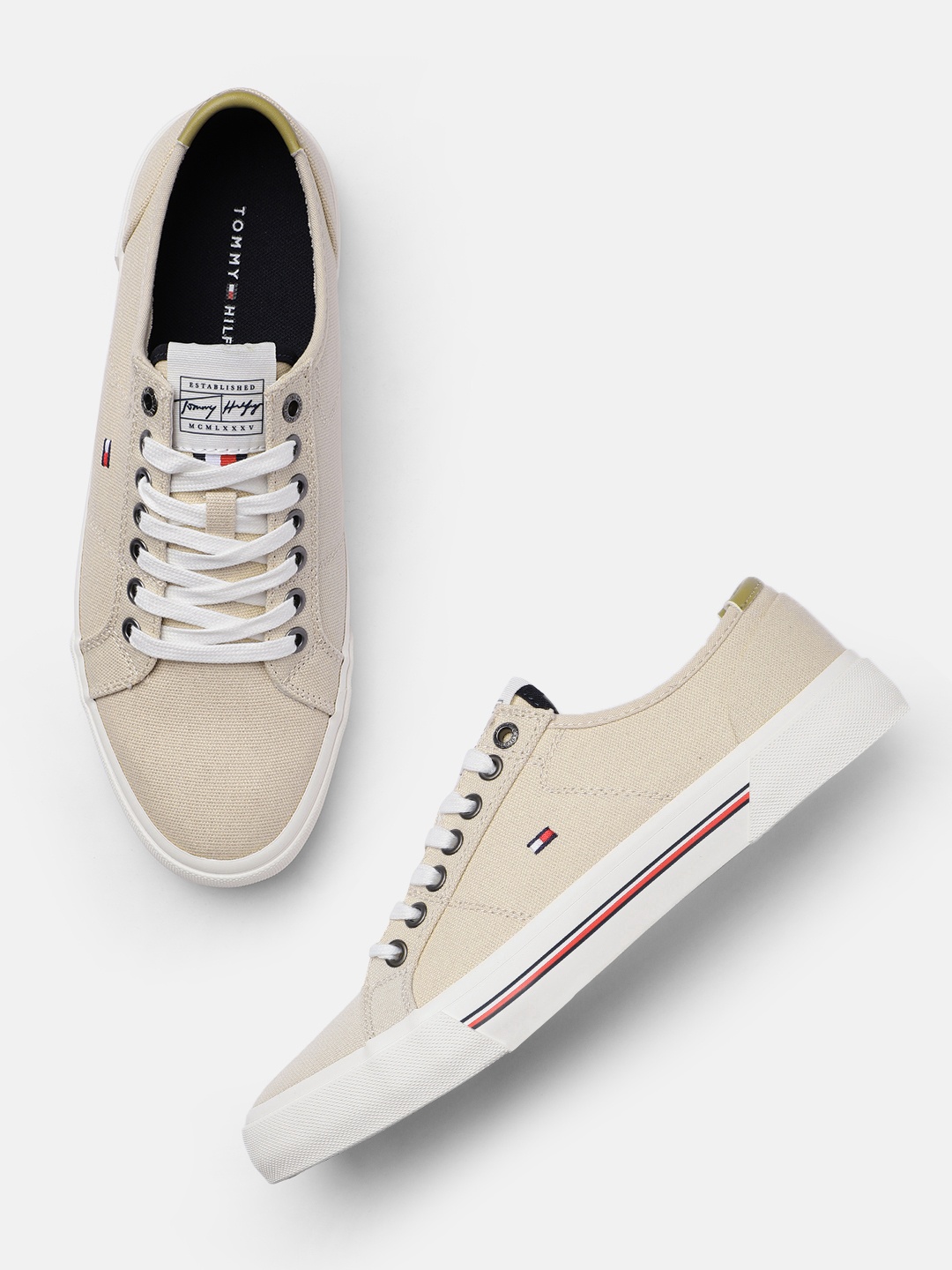 

Tommy Hilfiger Men Beige Solid Sneakers
