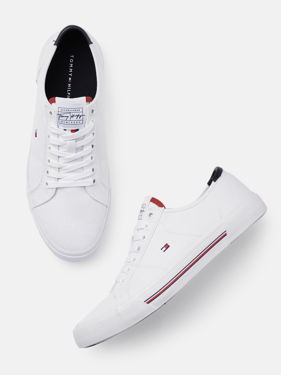 

Tommy Hilfiger Men White Solid Sneakers