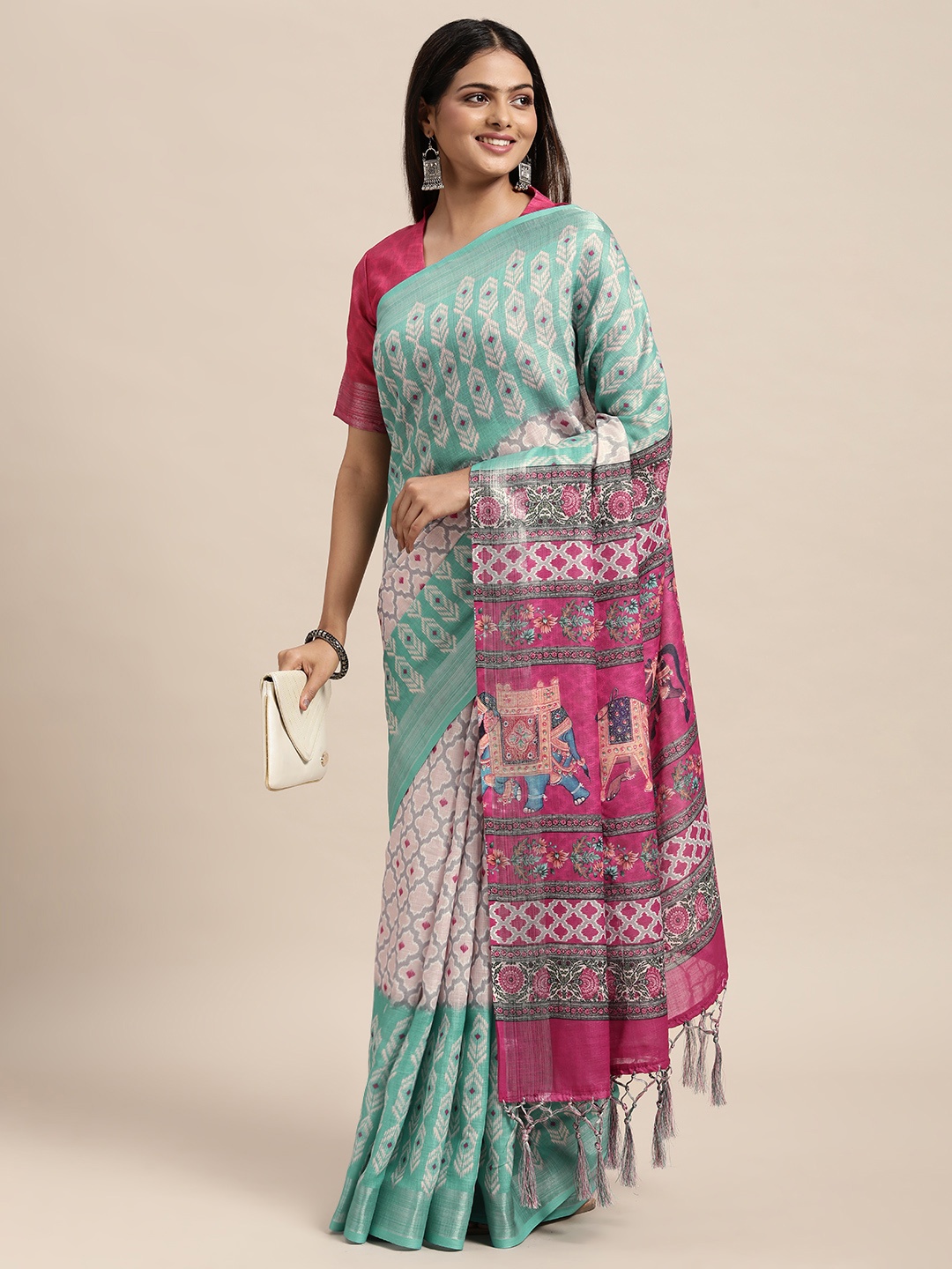 

Janasya Sea Green & White Ethnic Motifs Linen Blend Saree