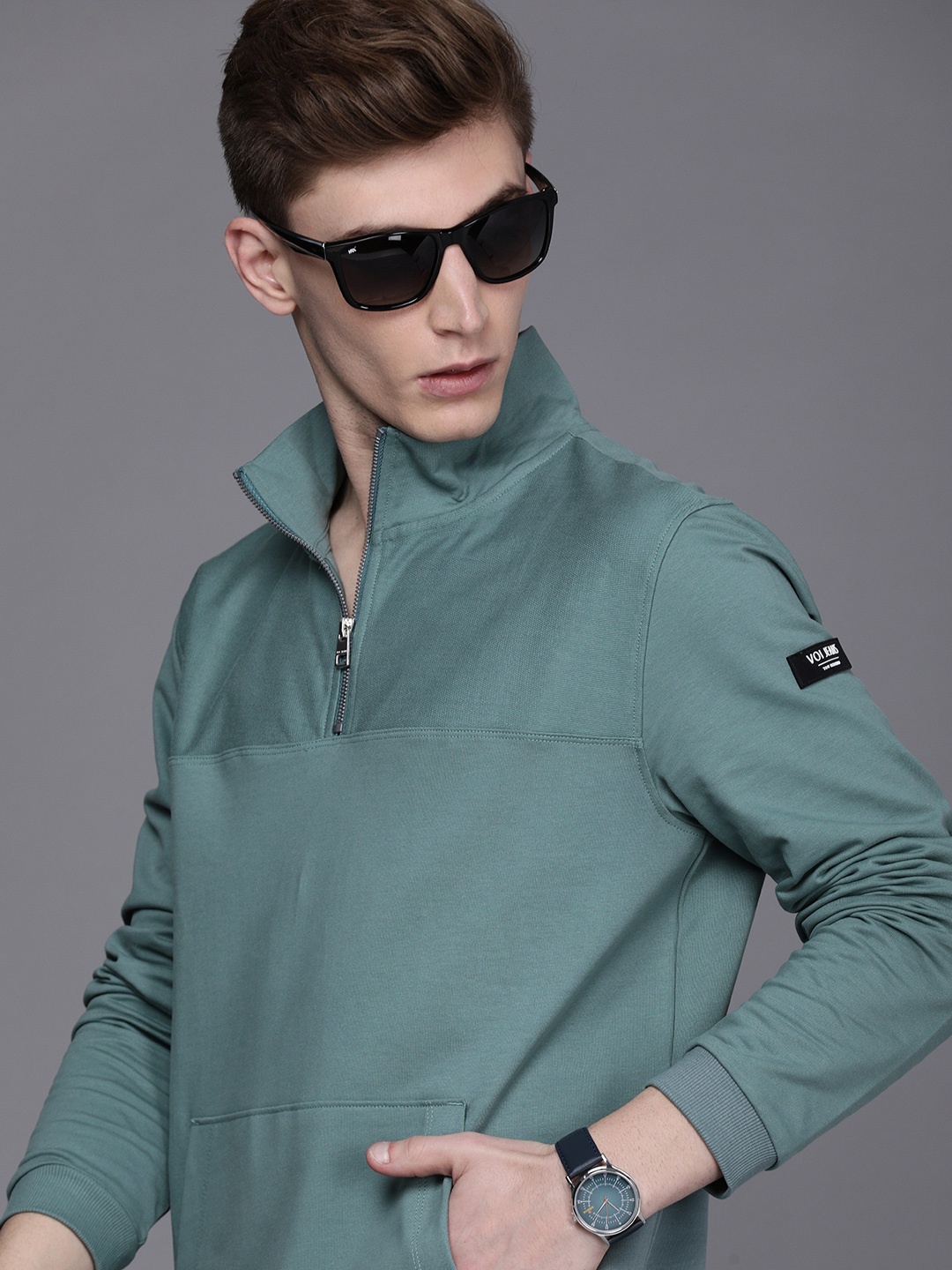 

Voi Jeans Men Sea Green Solid Cotton Half Zipper Sweatshirt