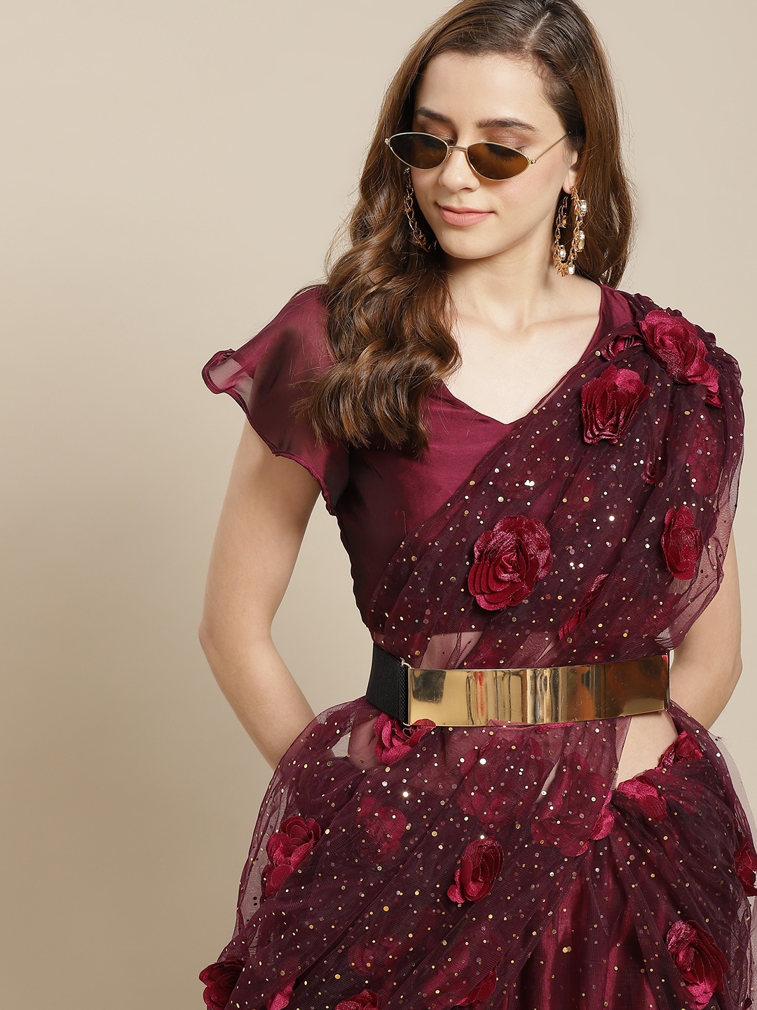 

Tikhi Imli Maroon Embellished Patchwork Net Saree