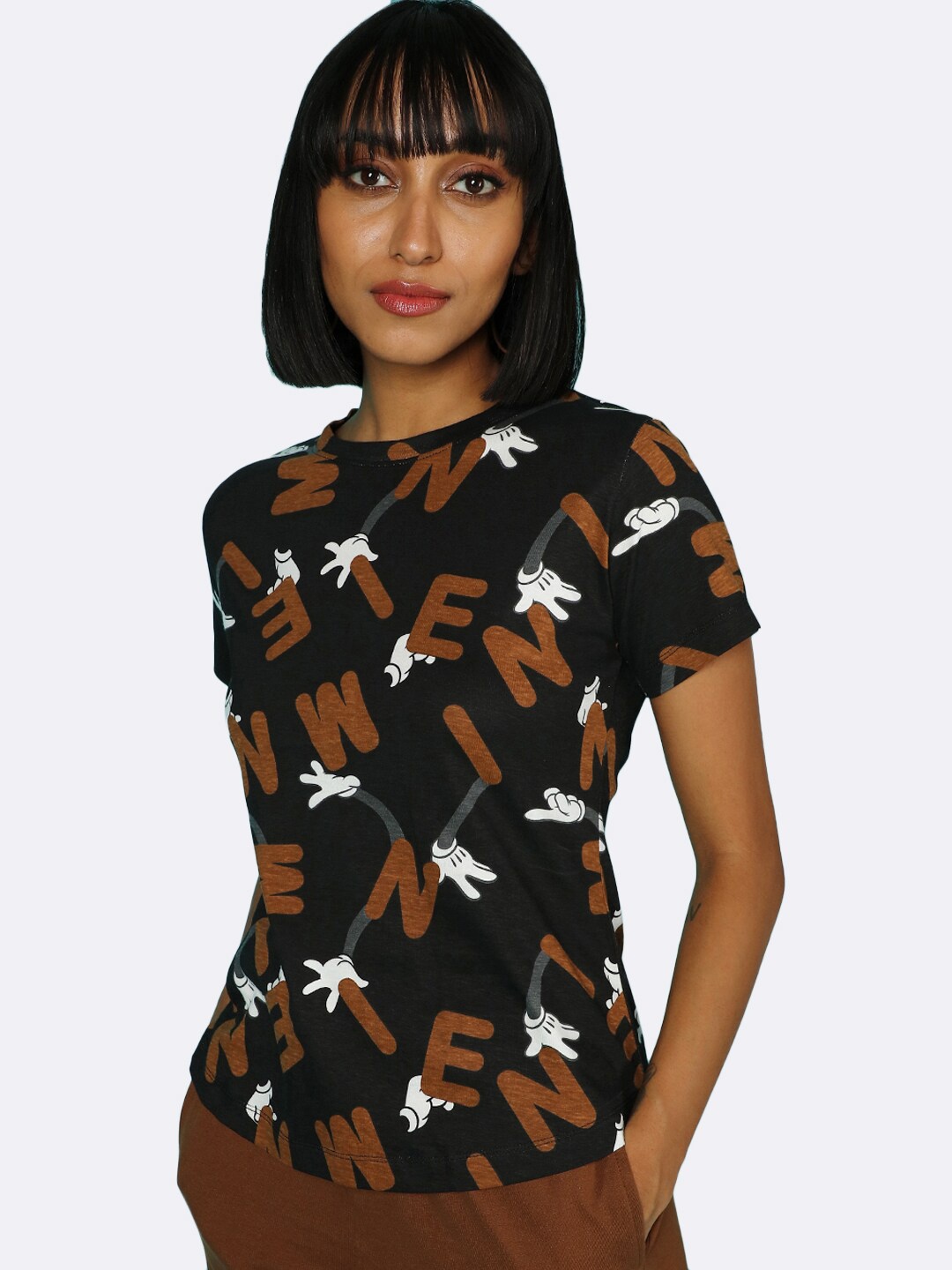 

Bewakoof Women Brown Printed Extended Sleeves Pockets T-shirt