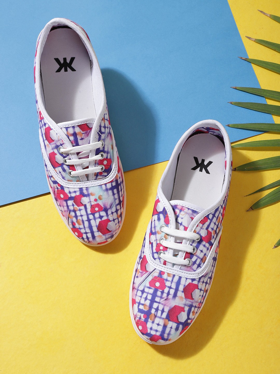 

Kook N Keech Women Purple & Fuchsia Pink Printed Sneakers