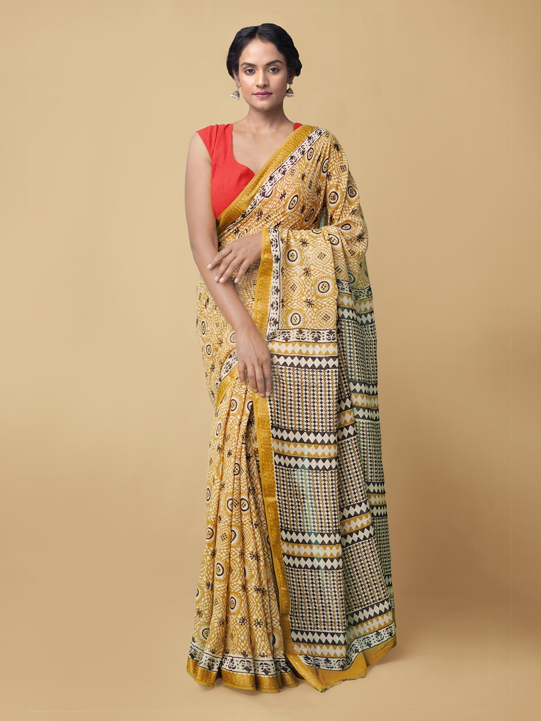

Unnati Silks Yellow & Black Floral Bagru Saree