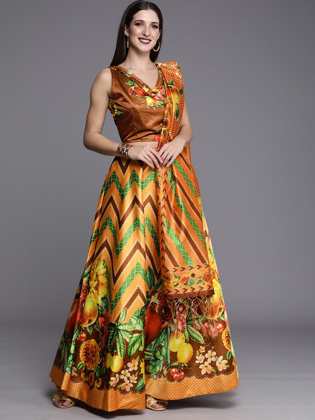 

Mitera Women Brown & Orange Printed Kalamkari Semi-Stitched Lehenga & Blouse With Dupatta
