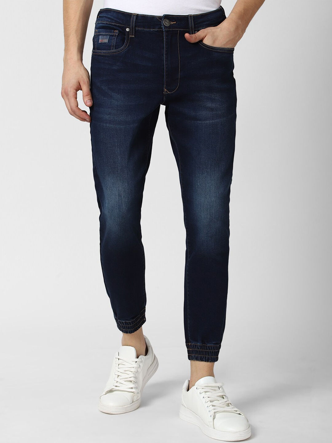 

Peter England Casuals Men Blue Light Fade Jeans