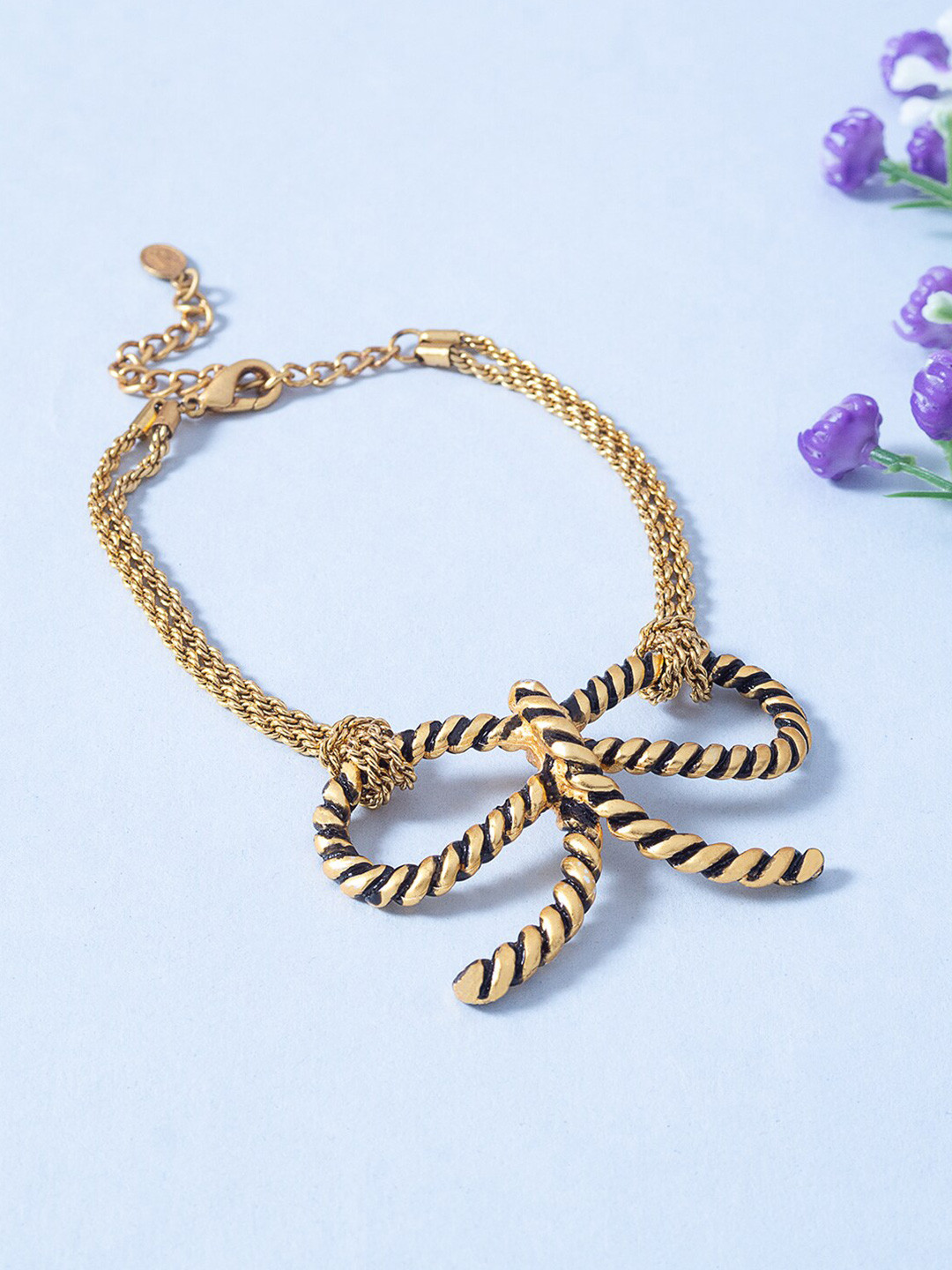 

Golden Peacock Women Gold-Toned & Black Bow Charm Link Bracelet