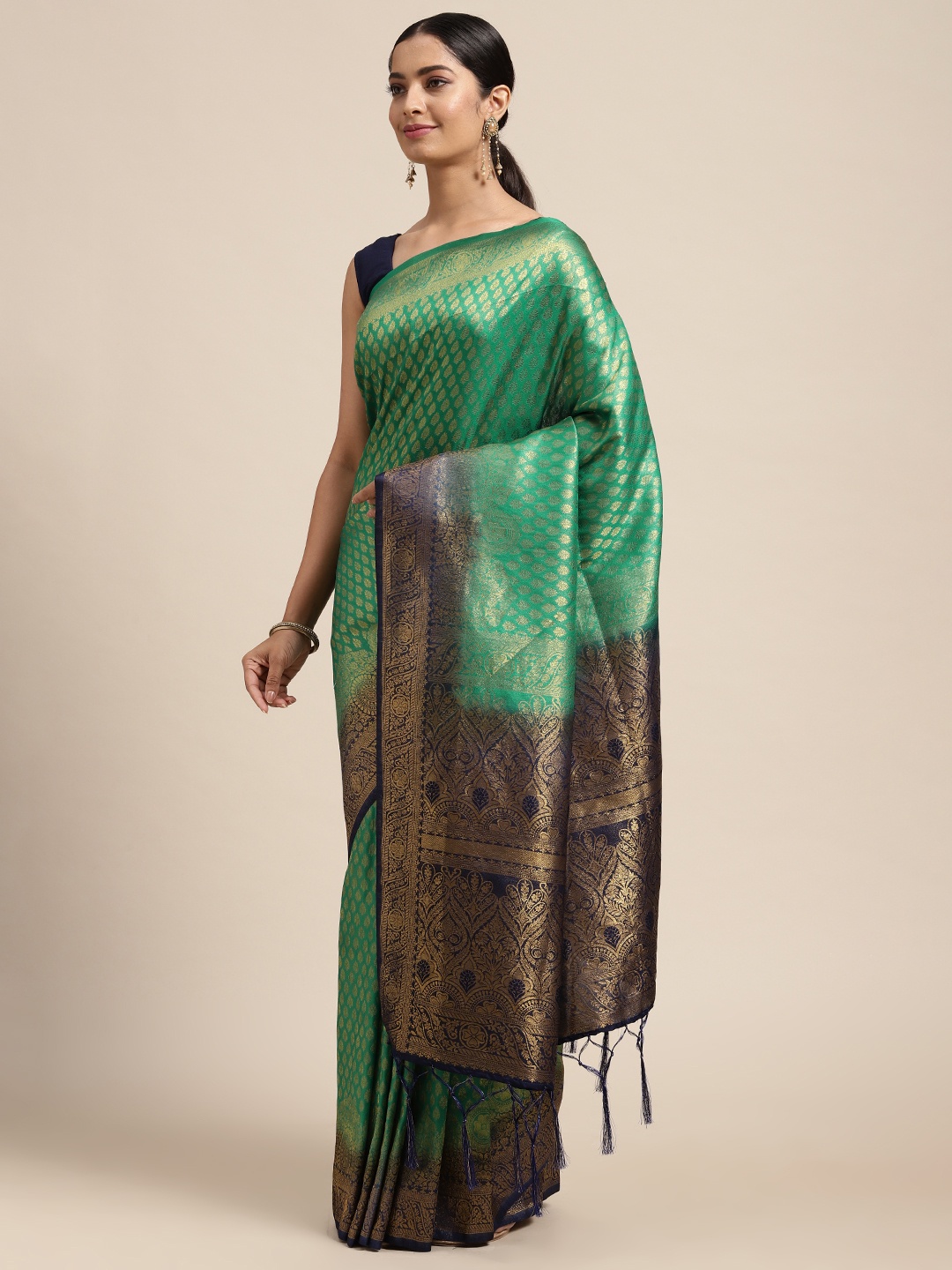 

DIVASTRI Sea Green & Gold-Toned Ethnic Motifs Zari Art Silk Banarasi Saree