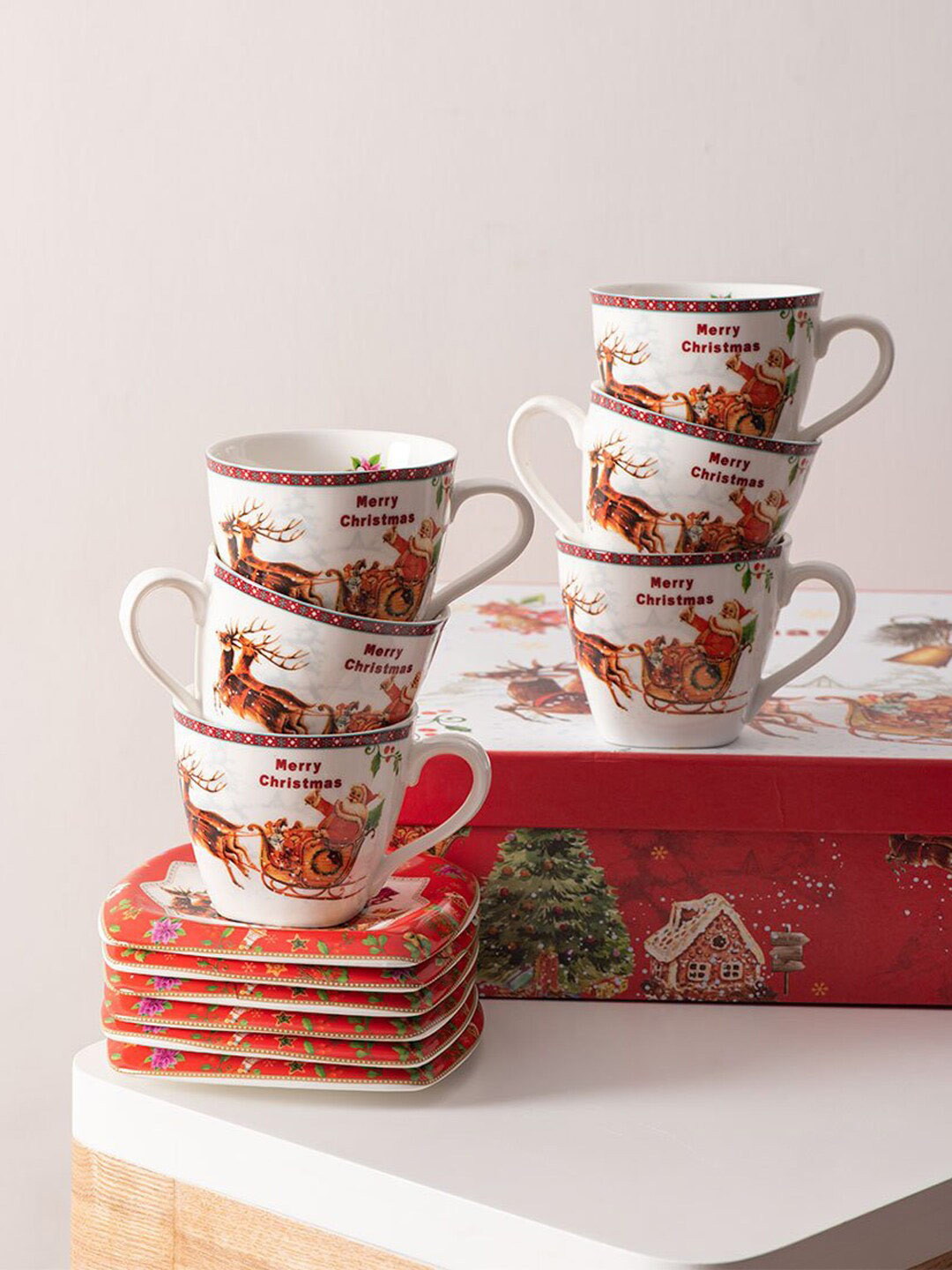 

THEDECORKART 12 Pcs Red & White Christmas Printed Ceramic Matte Cups and Saucers