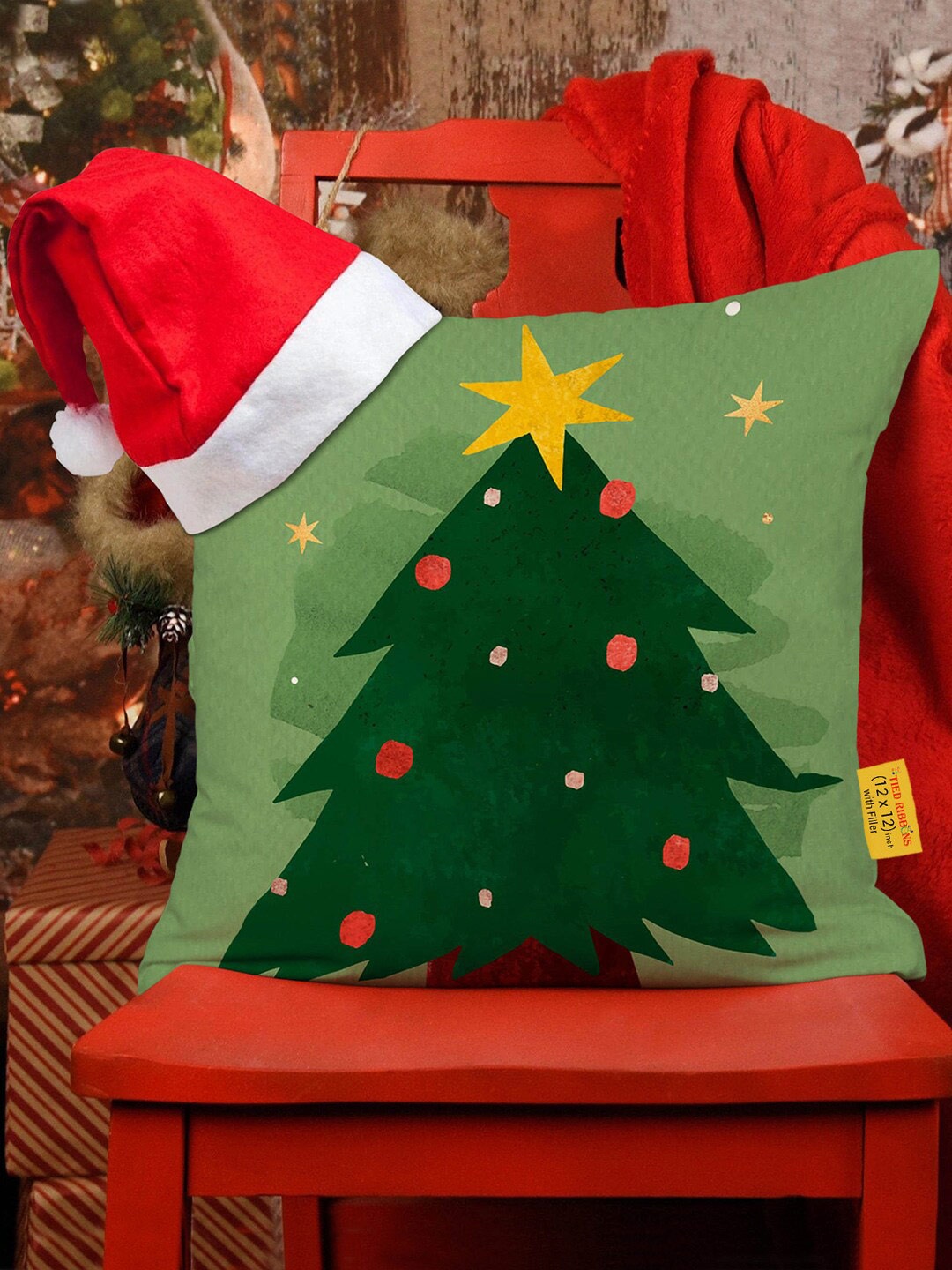 

TIED RIBBONS Green Christmas Printed Cushion Cover With Filler & Santa Cap