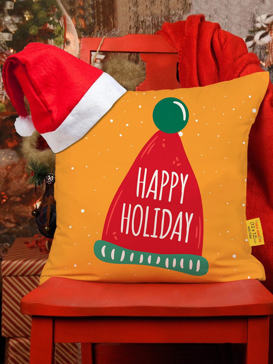 

TIED RIBBONS Yellow & Red Christmas Printed Square Cushion Cover With Filler & Santa Cap