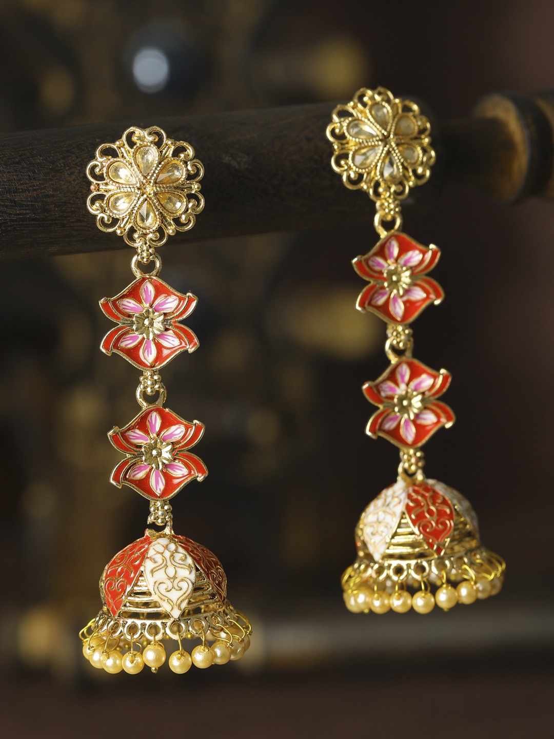 

Priyaasi Gold-Toned & Red Dome Shaped Jhumkas Earrings