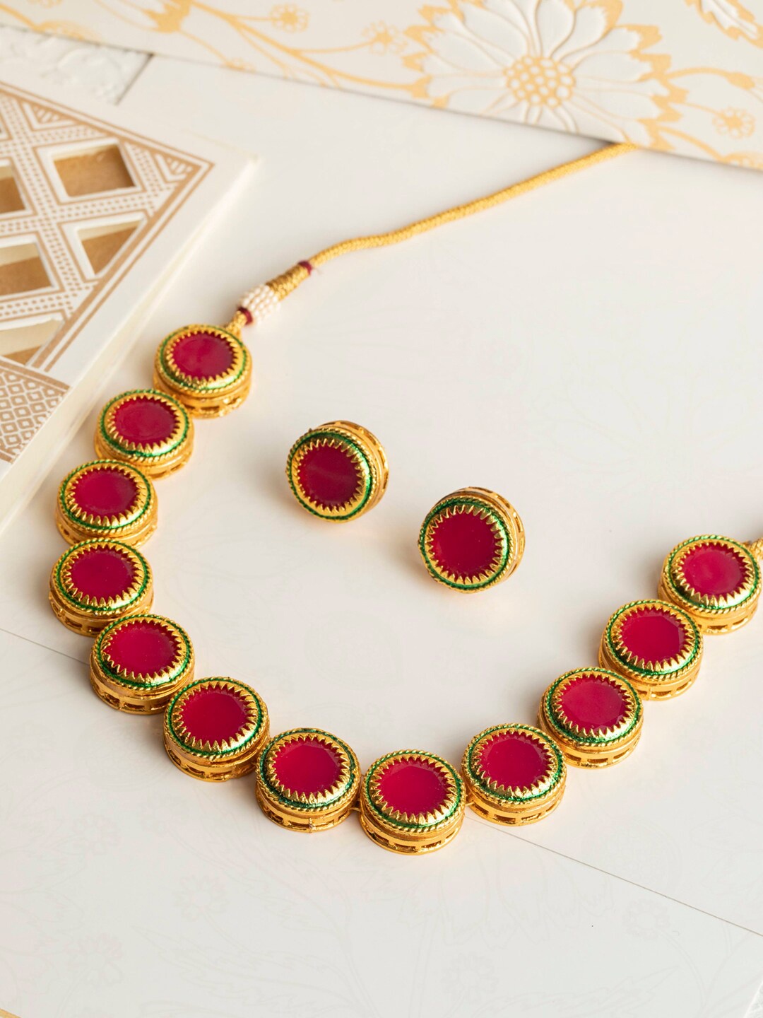 

Priyaasi Gold-Plated Red & Green Stone Studded Choker Jewellery Set