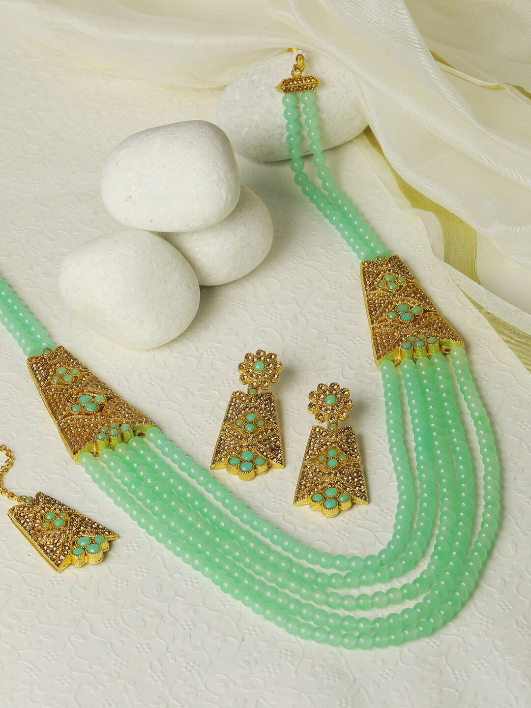 

Priyaasi Gold-Plated Mint Green Stone Studded & Beaded Jewellery Set