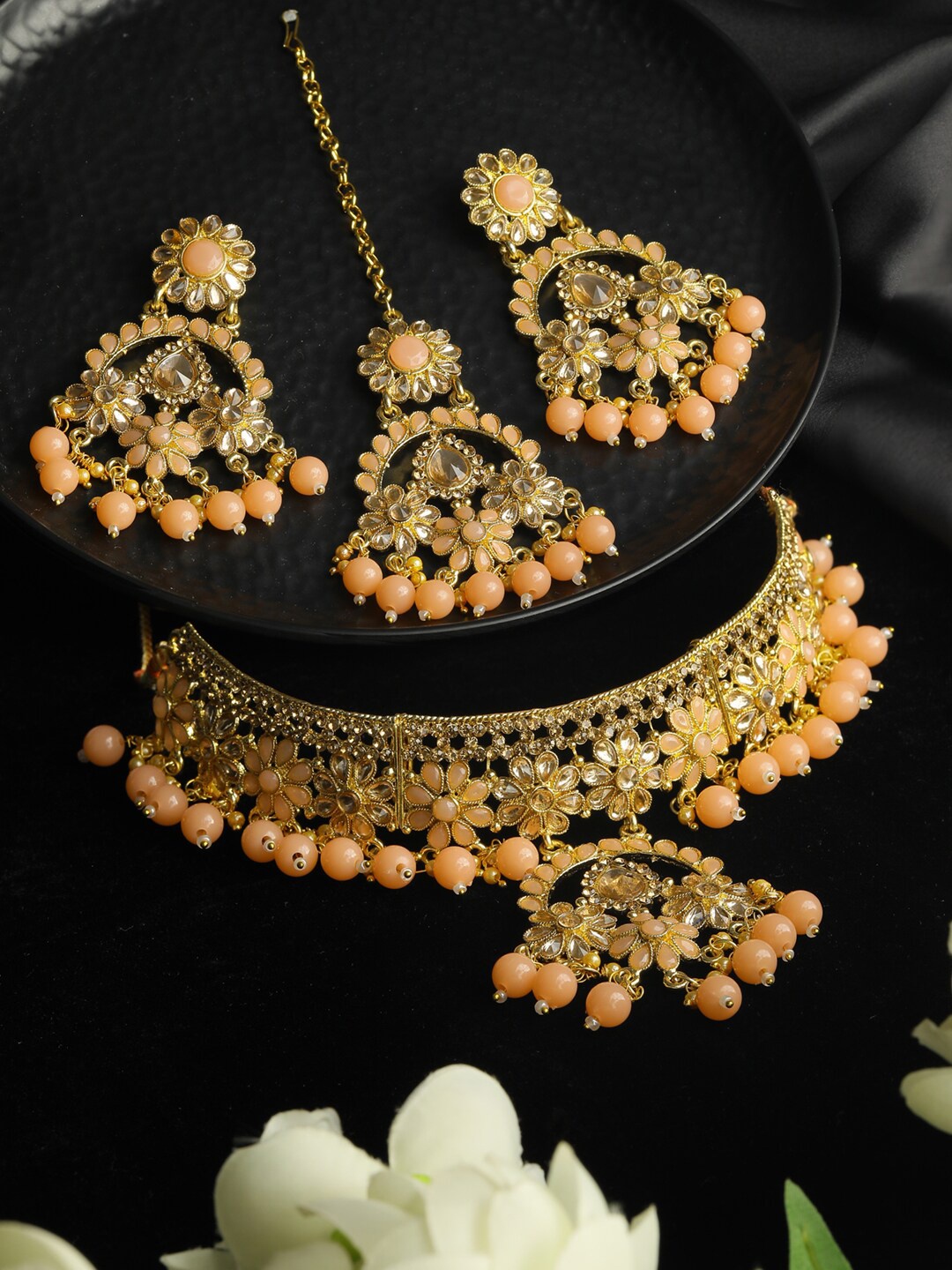 

Priyaasi Gold-Plated Peach-Coloured Kundan Studded & Beaded Jewellery Set