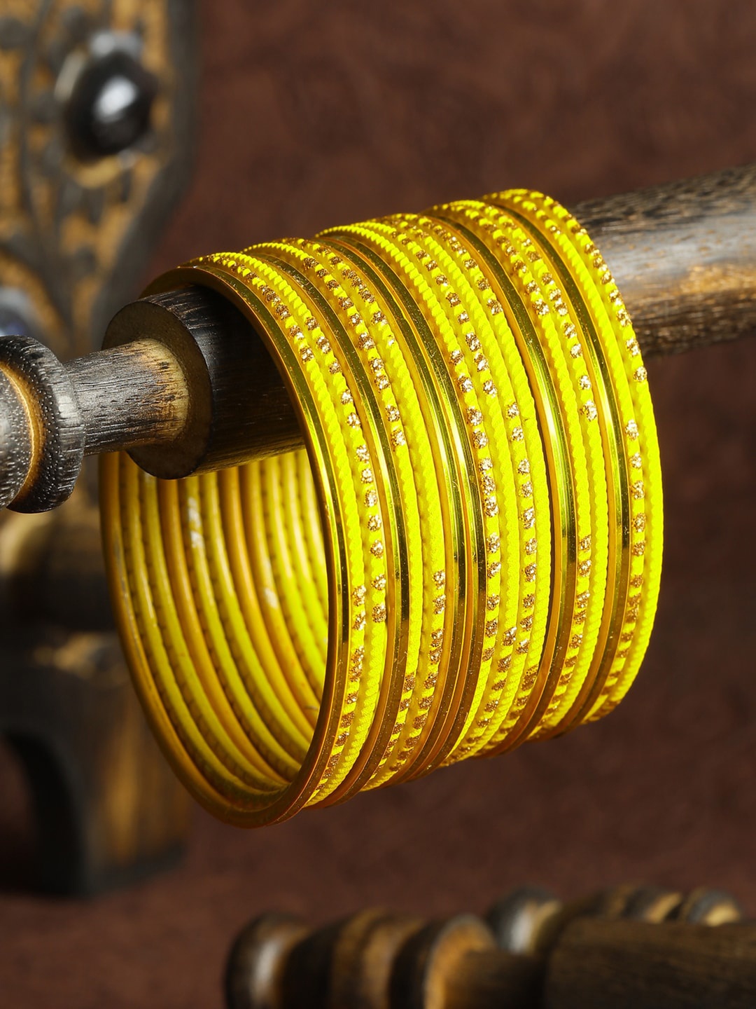 

Priyaasi Set of 24 Yellow Embellished Bangle